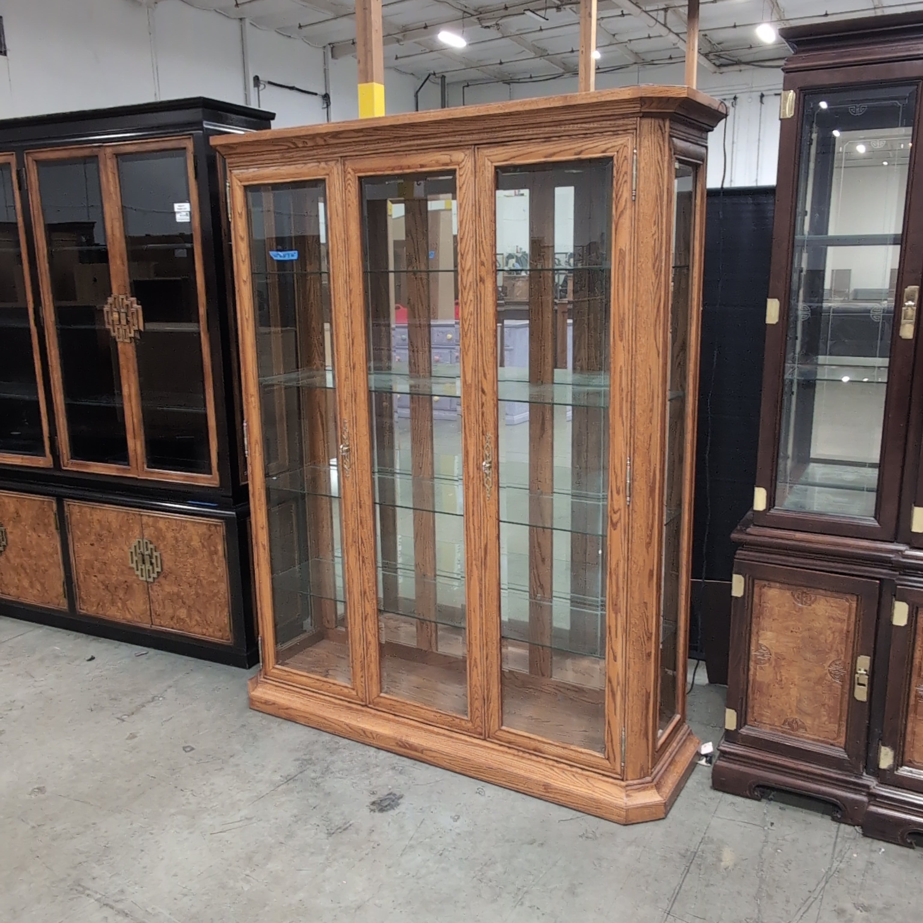 Oak Finish Three-Door China Cabinet with Crown Molding