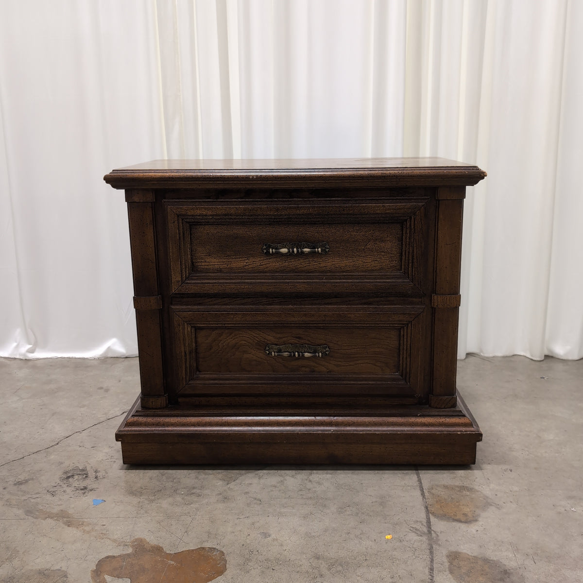 Traditional Dark Wood Dresser with Ornate Hardware