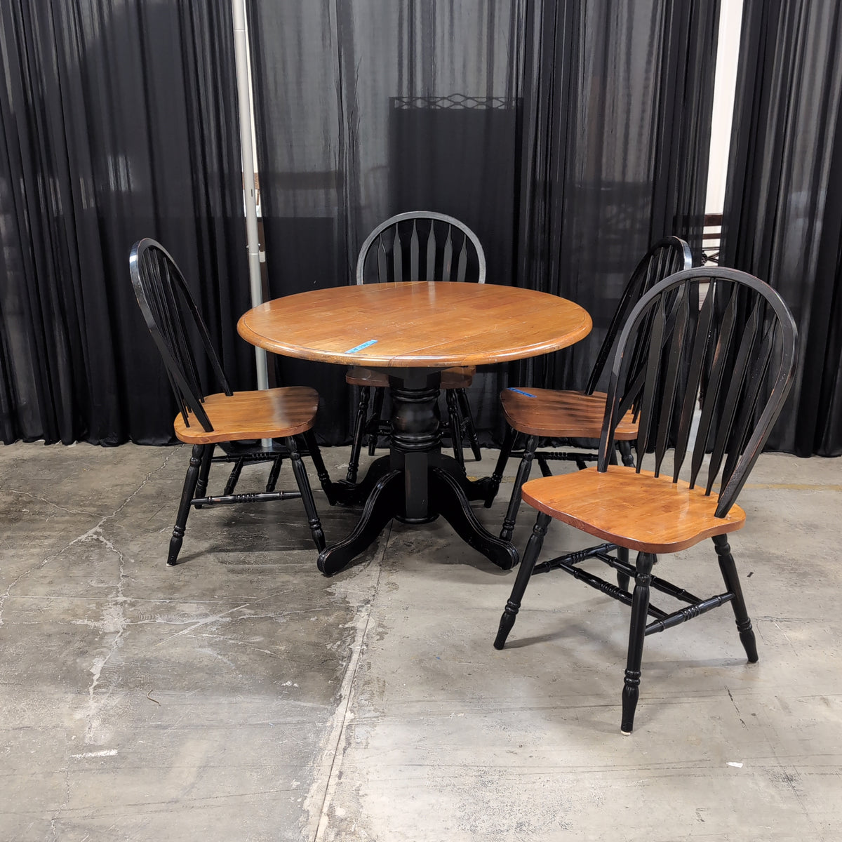 Two-Tone Round Dining Table with Windsor Chairs