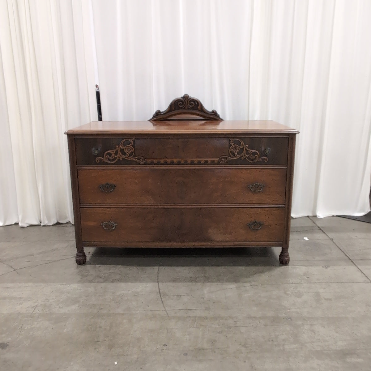 Vintage Brown Wood Three-Drawer Dresser with Carved Details