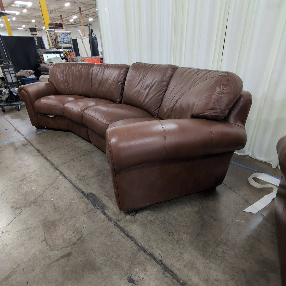 Brown Leather Curved Sectional Couch