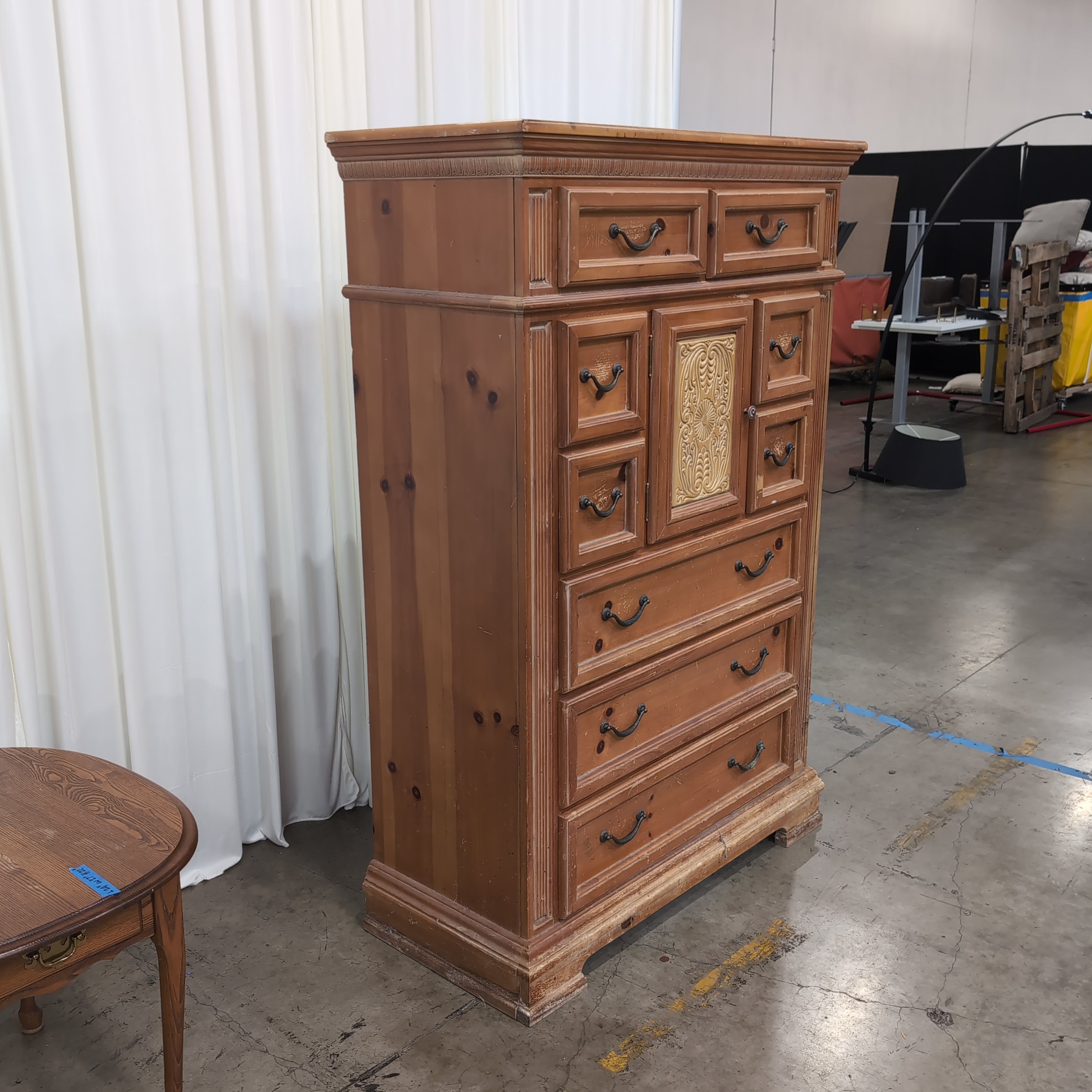 Traditional Carved Wood Dresser with Decorative Panel
