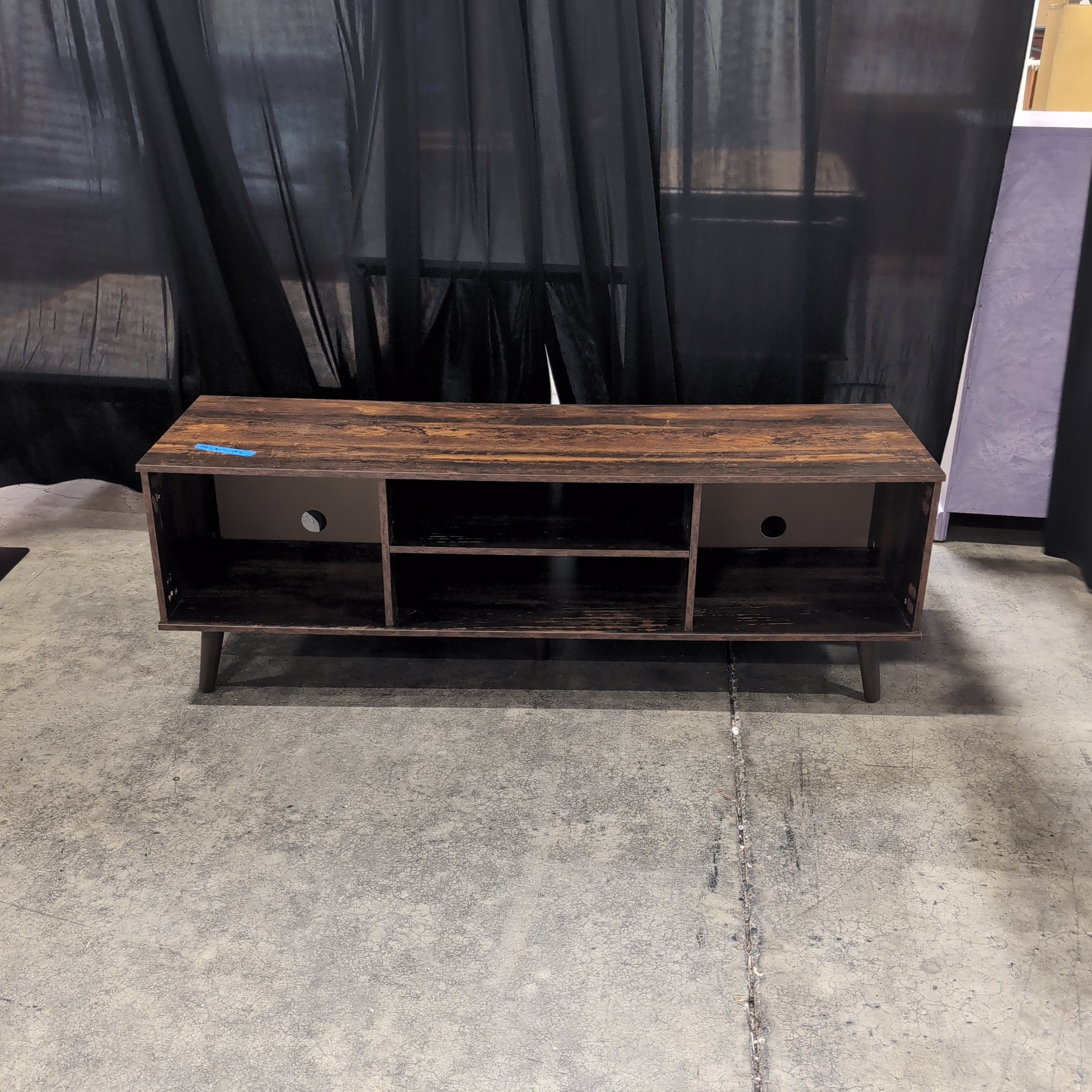 Distressed Dark Wood Multi-Shelf TV Stand with Tapered Legs