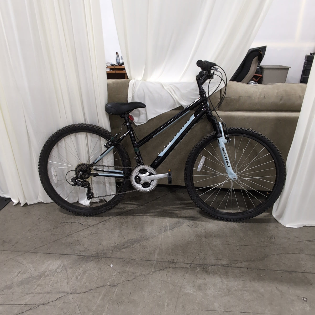 Black Nishiki Pueblo Mountain Bicycle with Front Suspension