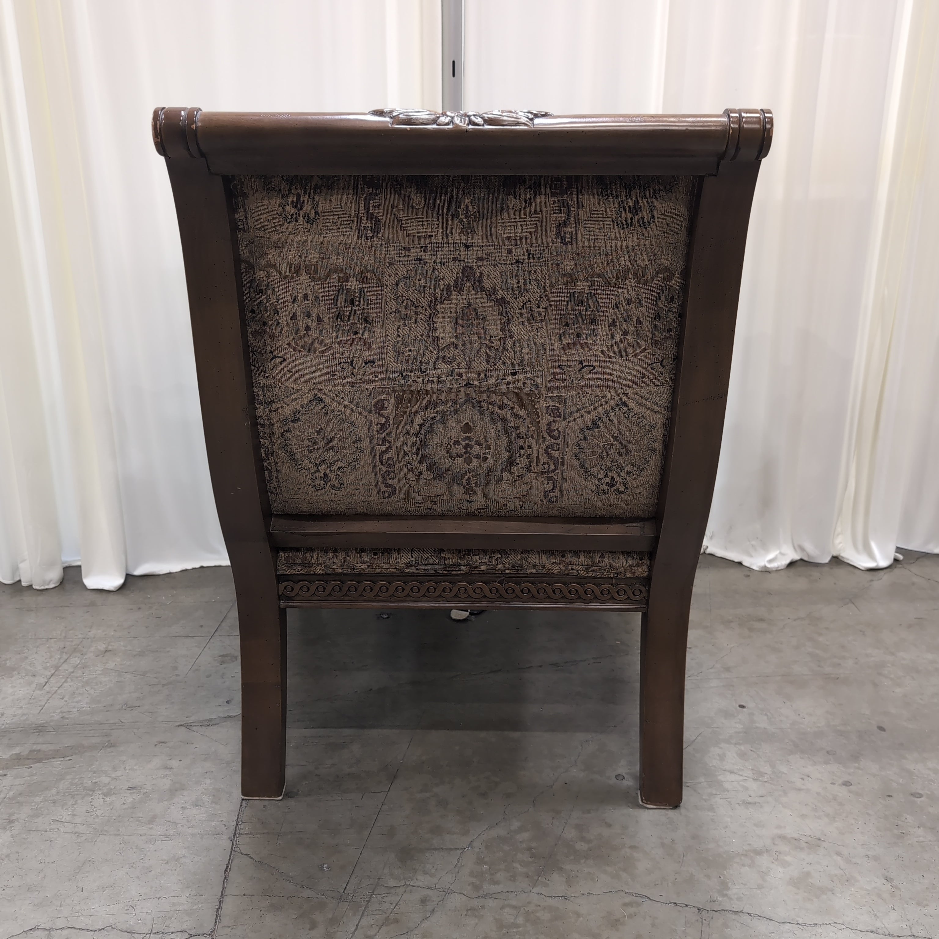 Traditional Carved Wood Accent Chair with Patterned Upholstery