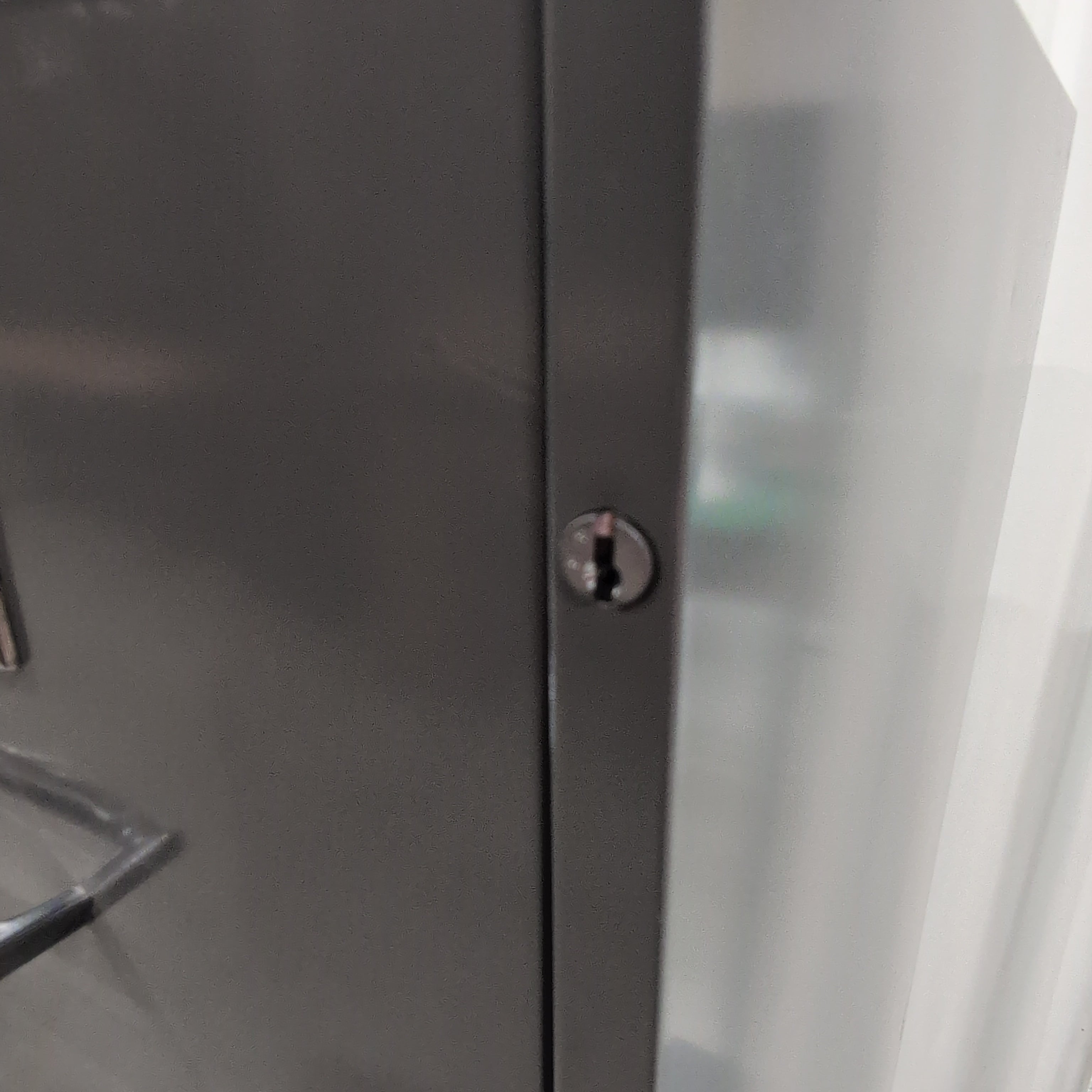 Montgomery Ward Grey Four-Drawer Filing Cabinet in Metal