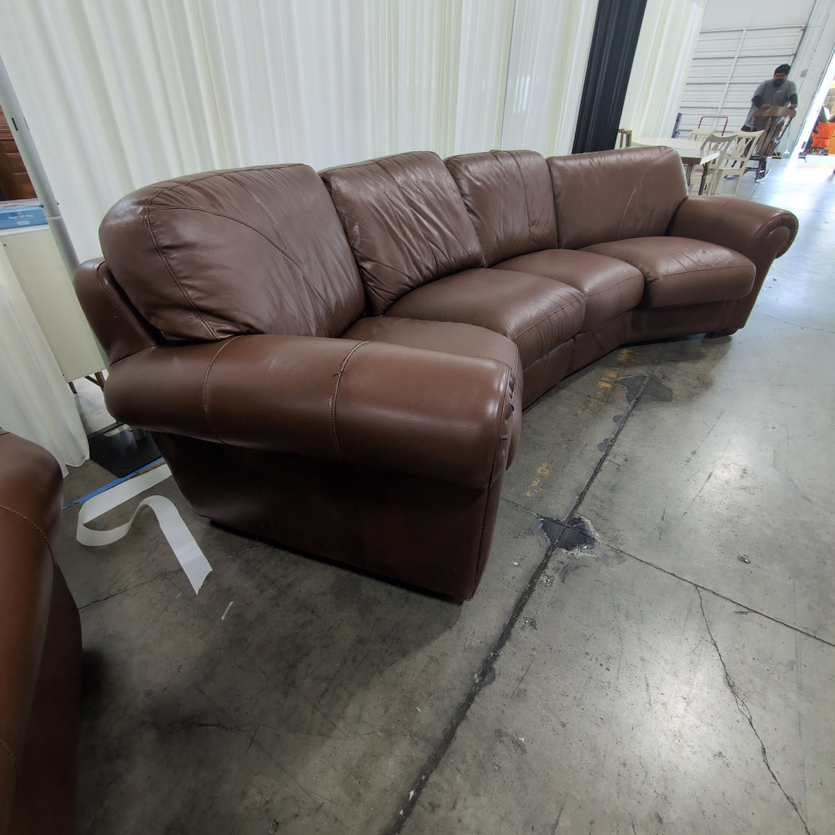 Brown Leather Curved Sectional Couch