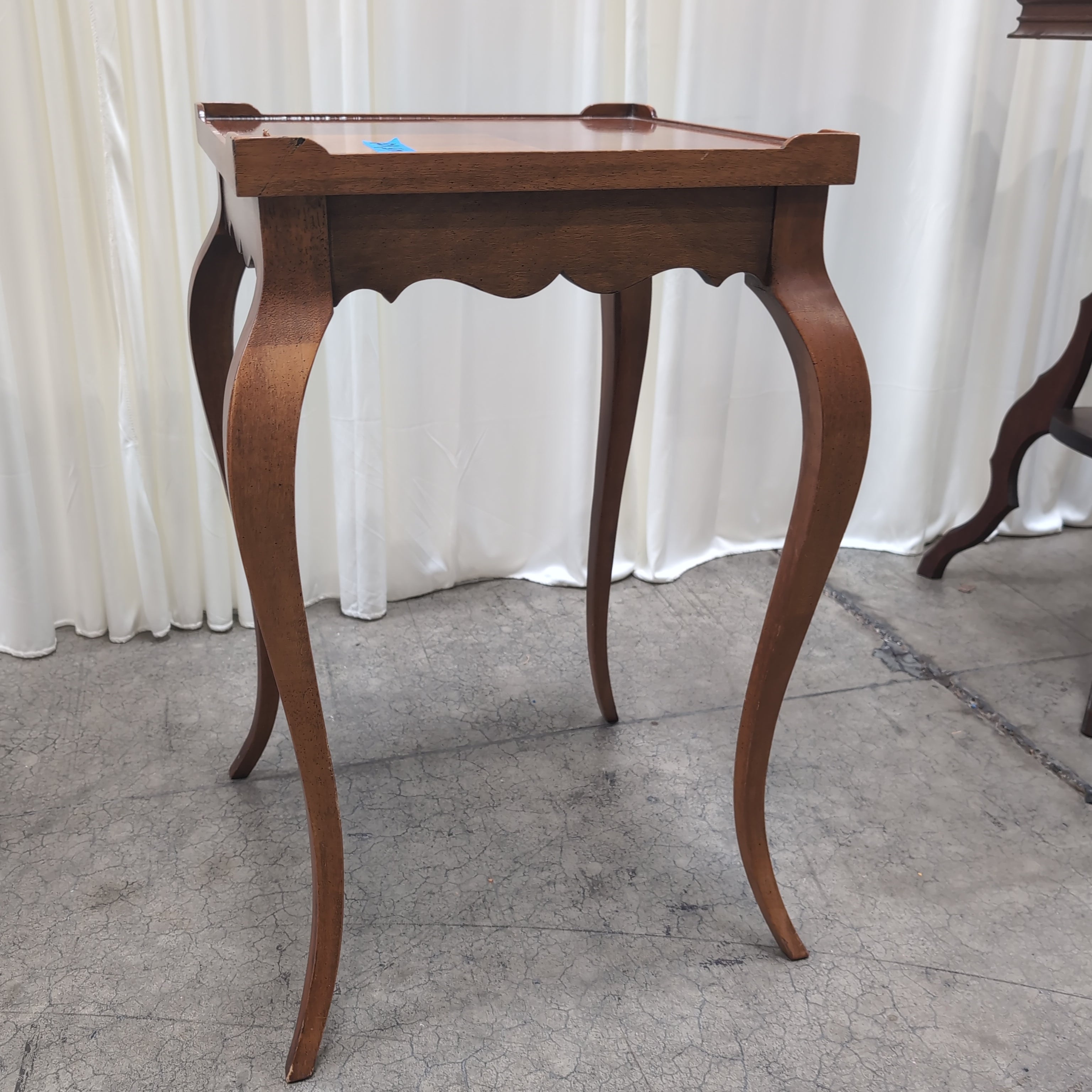 Dark Wood Scalloped End Table with Curved Legs