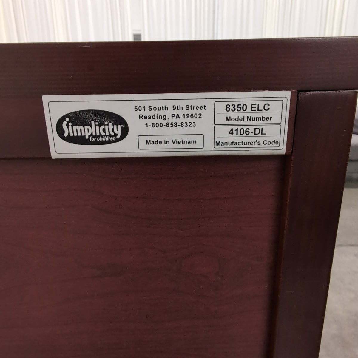 Reddish Brown Wood Dresser with Cabinet Door