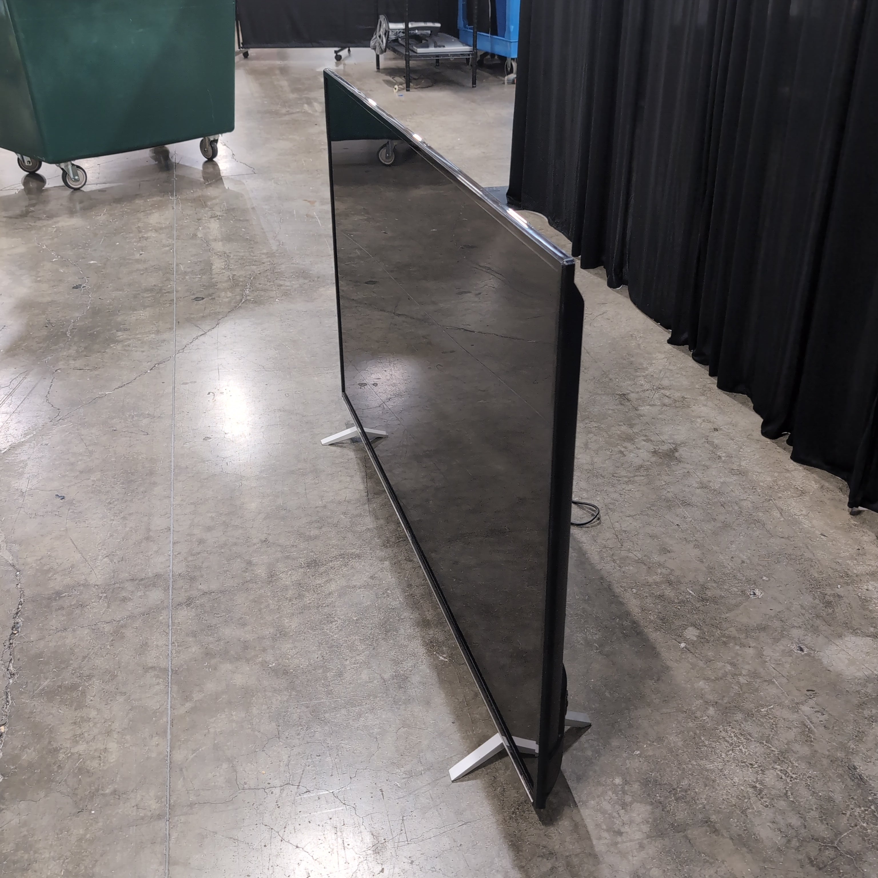 TCL 55-inch Black Flat Screen TV with Stand