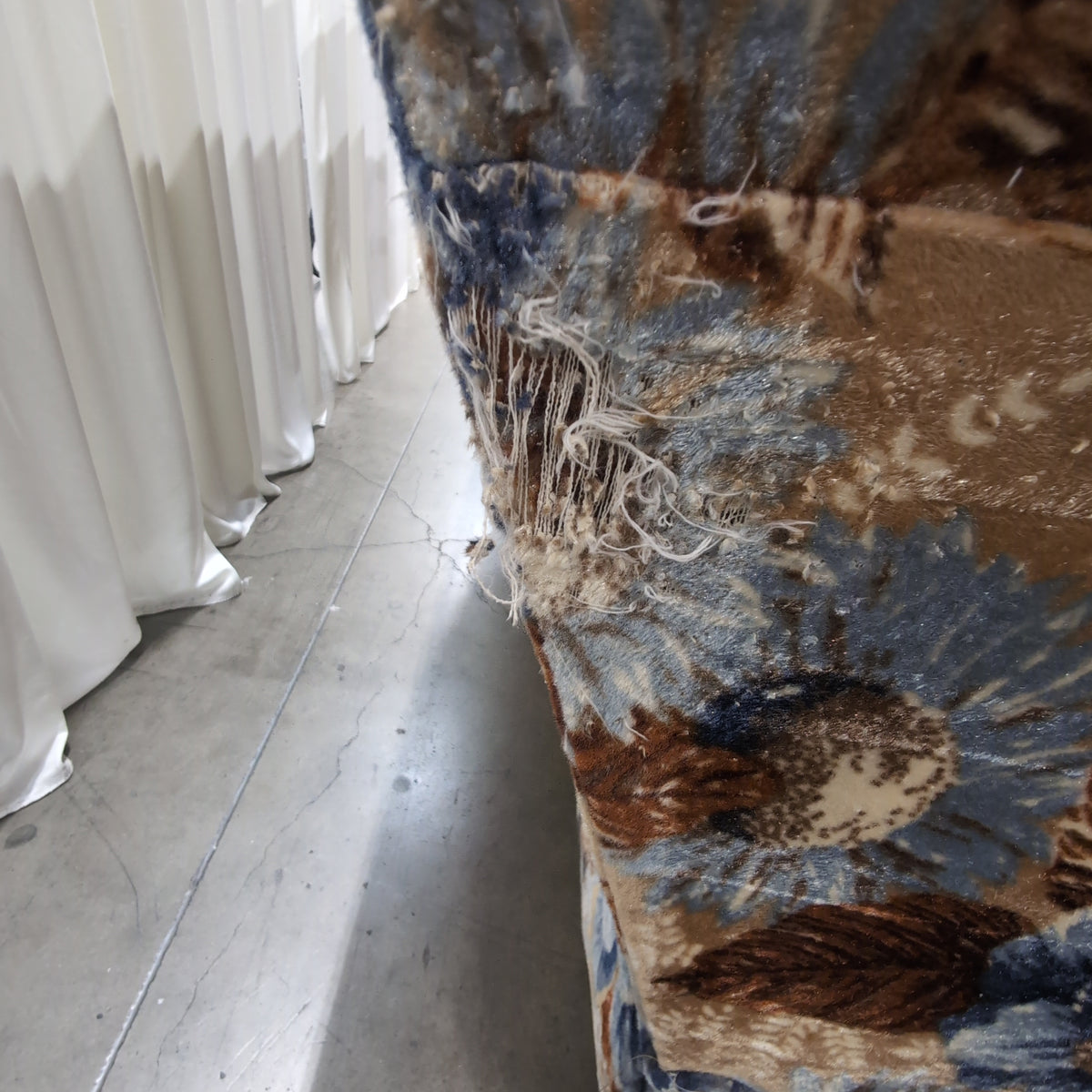 Vintage Floral Upholstered Couch with Wood Arms