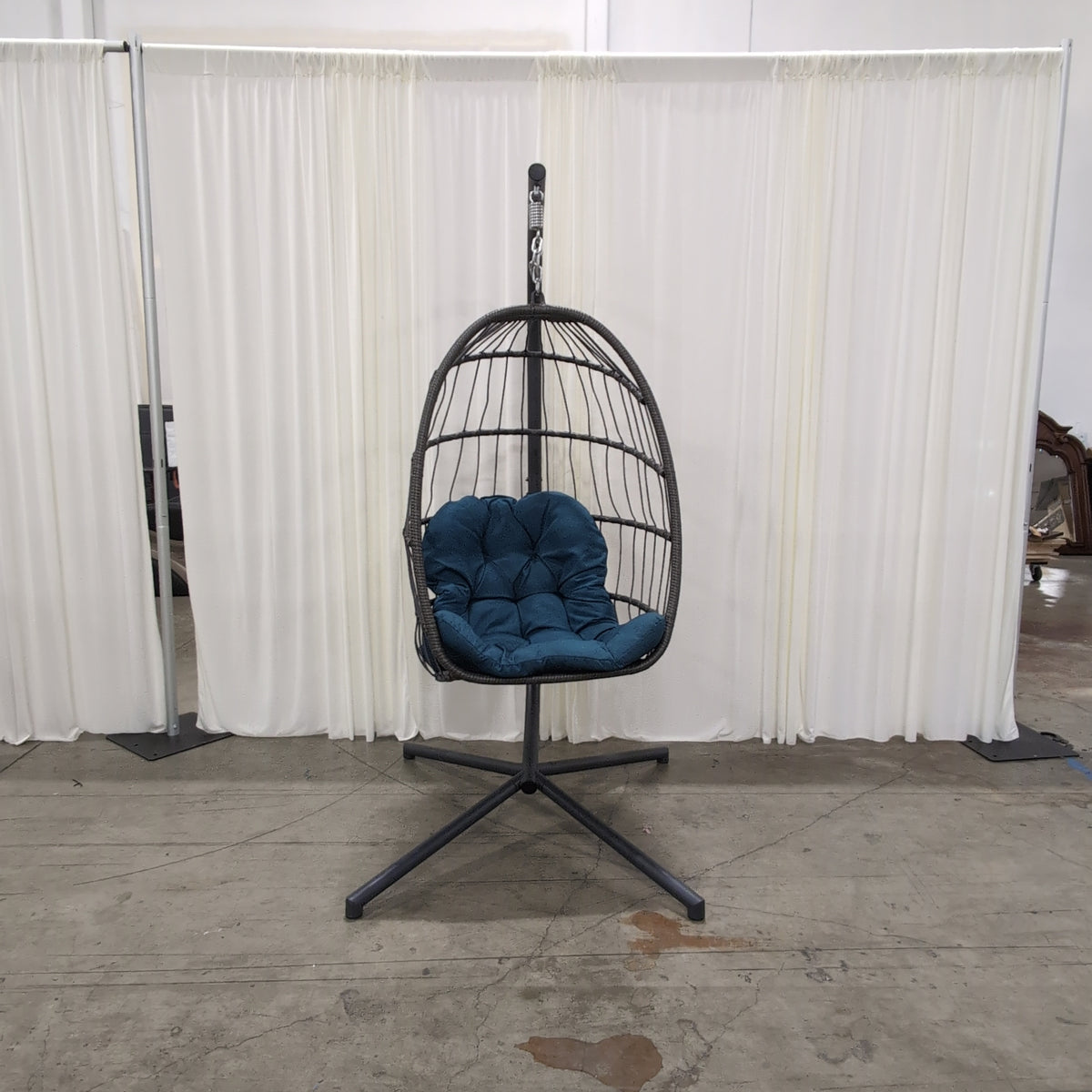Gray Wicker-Look Swing Egg Chair with Teal Cushion