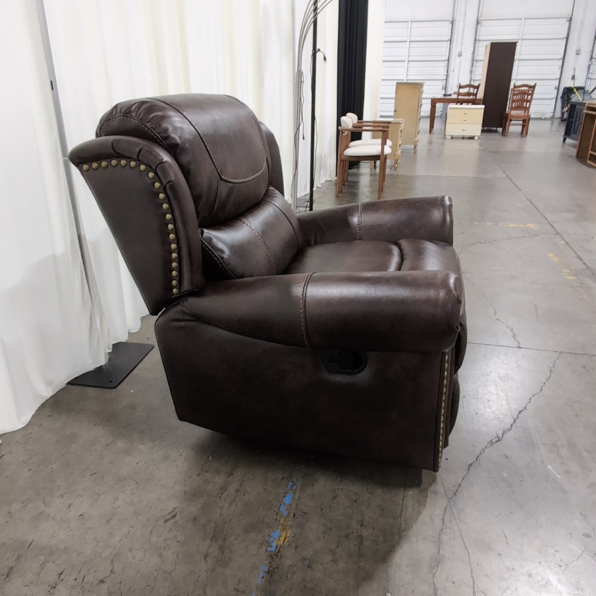 Dark Brown Padded Recliner with Nailhead Trim
