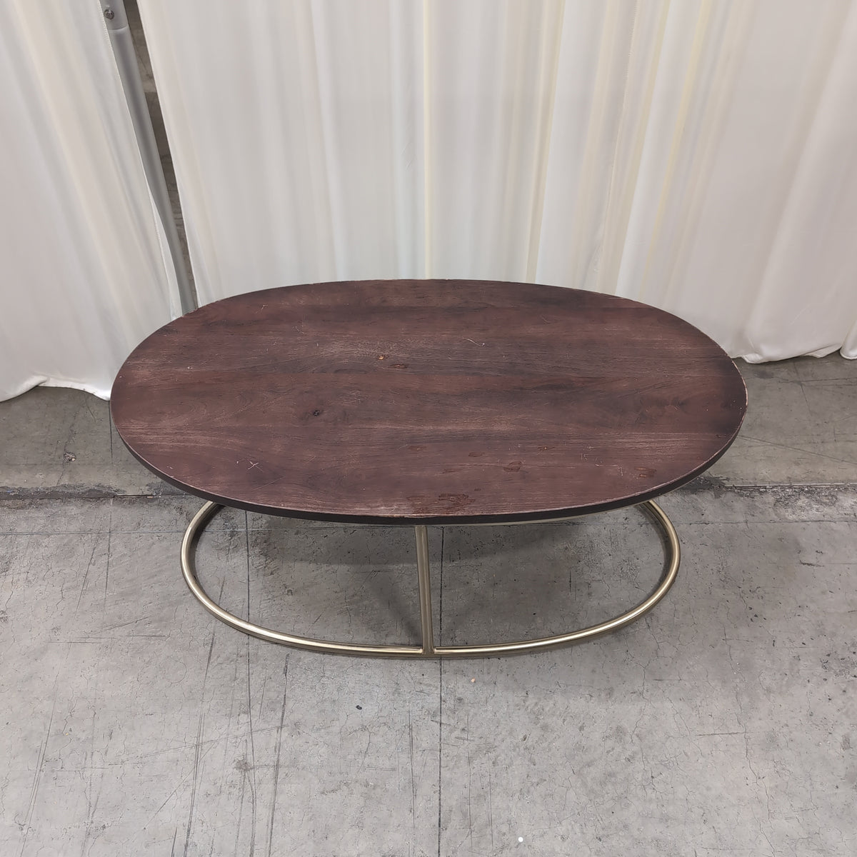 Oval Dark Wood Coffee Table with Gold Metal Base
