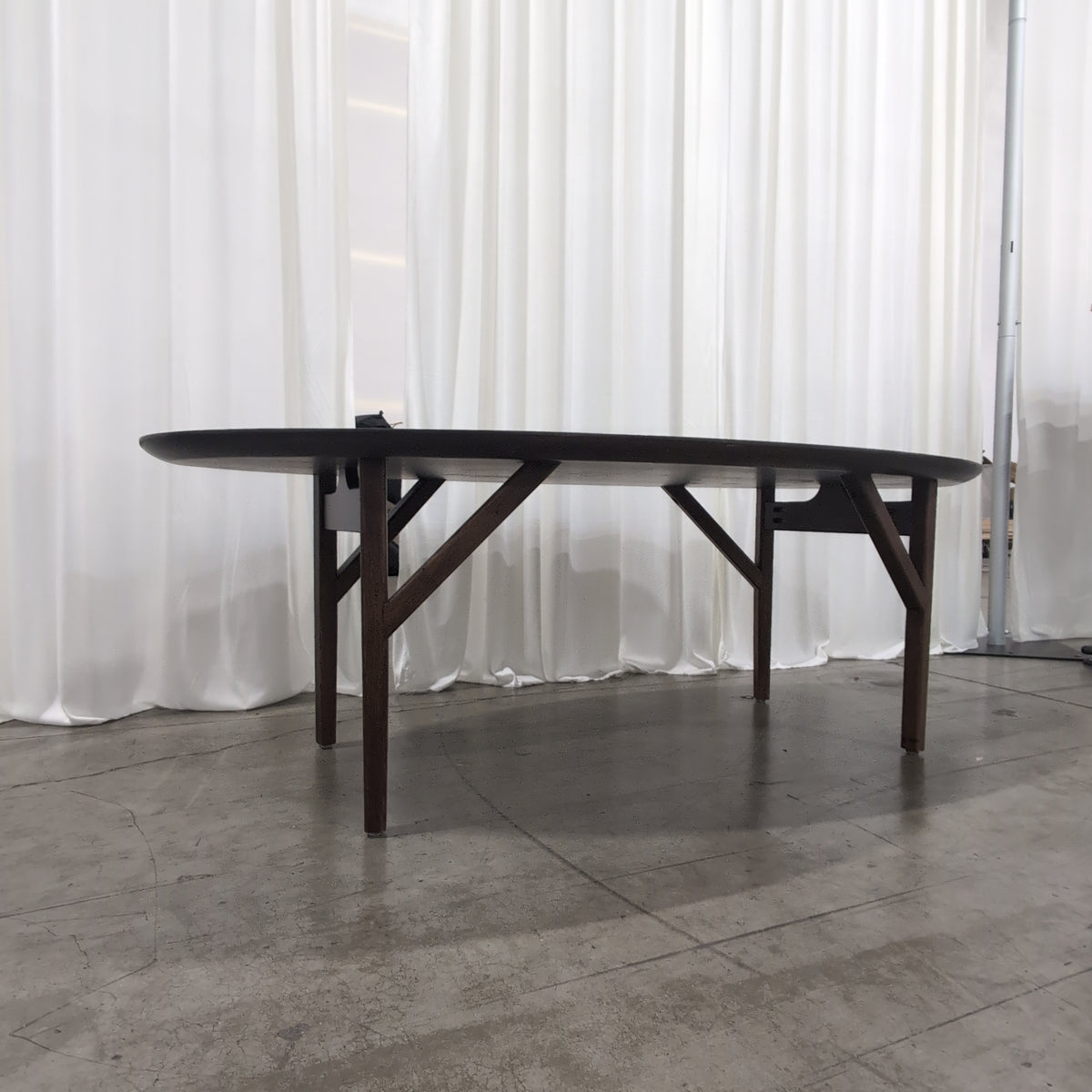 Oval Dark Wood Dining Table with Angled Legs