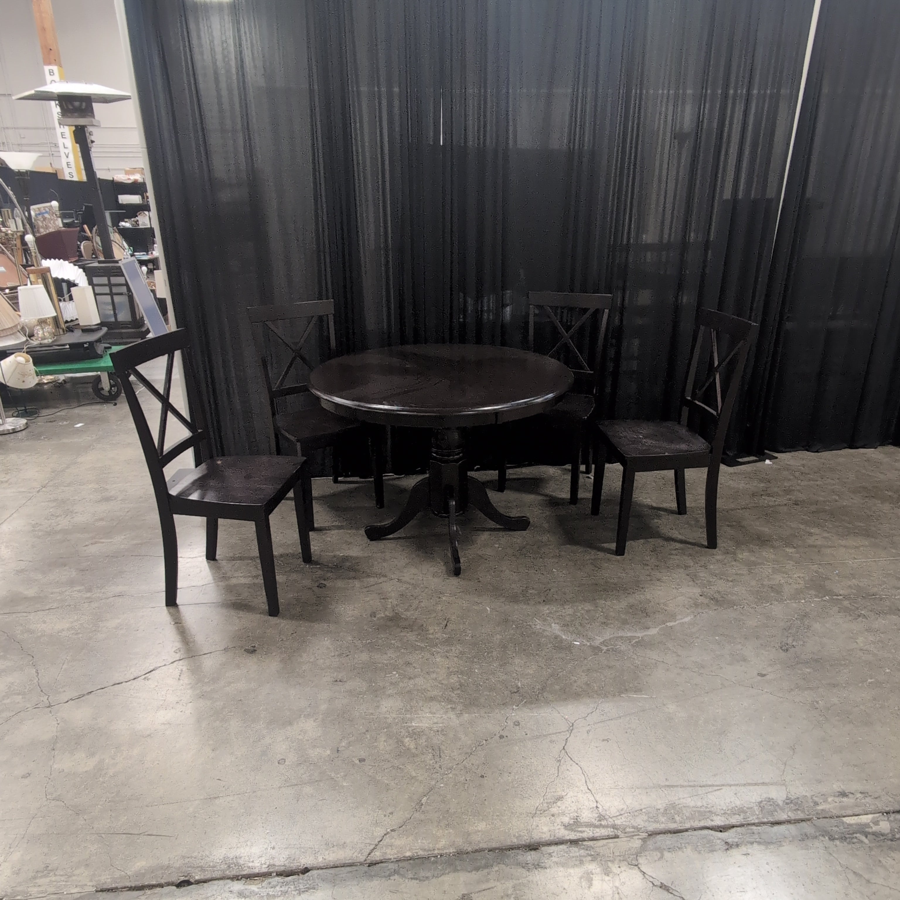 Dark Brown Wood Round Dining Table with X-Back Chairs