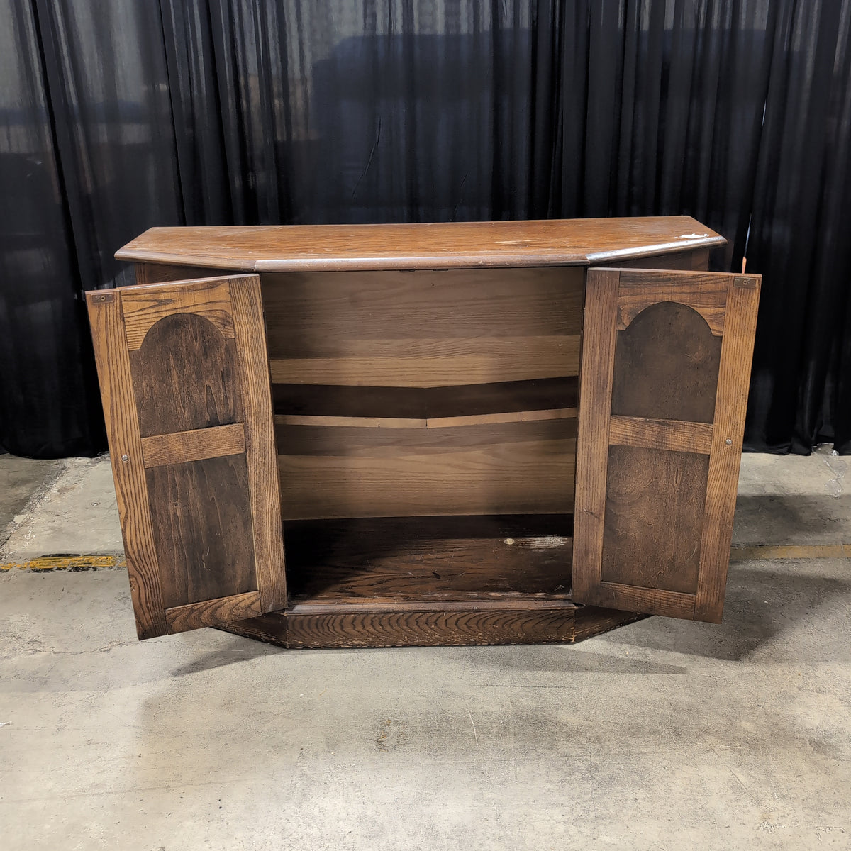 Dark Wood Corner Cabinet with Arched Panels