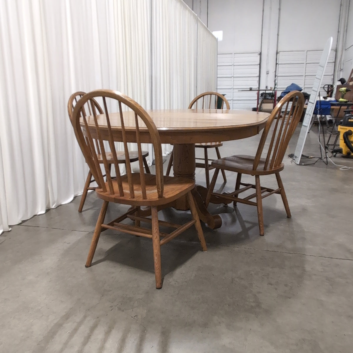 Oval Pedestal Wood Dining Table with Windsor Chairs