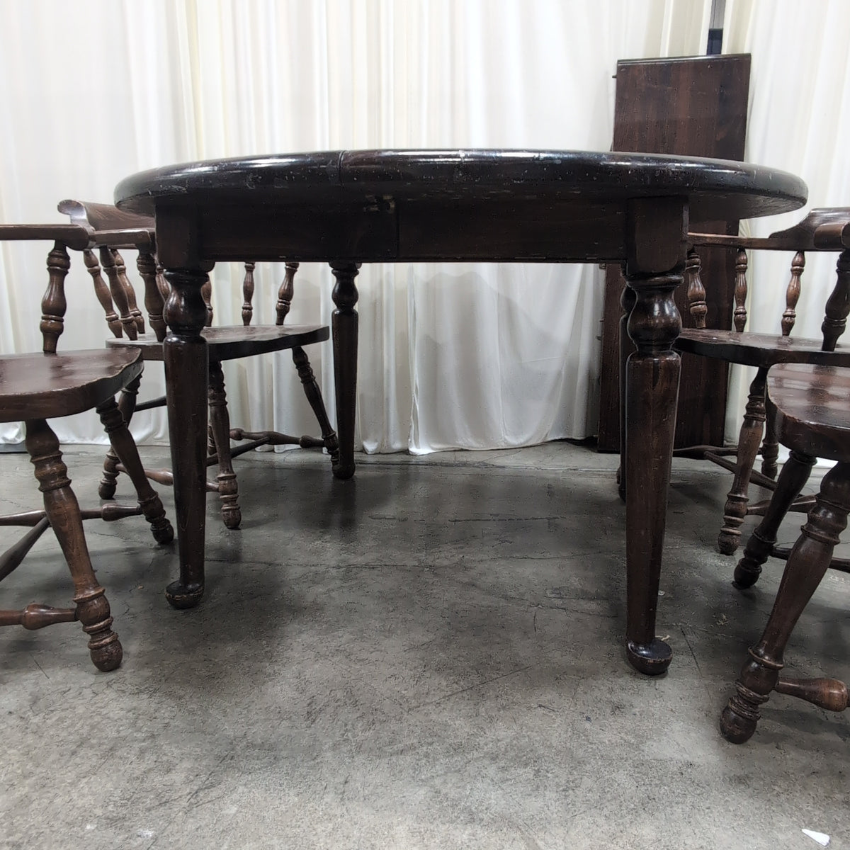 Dark Wood Round Dining Table with Spindle Chairs