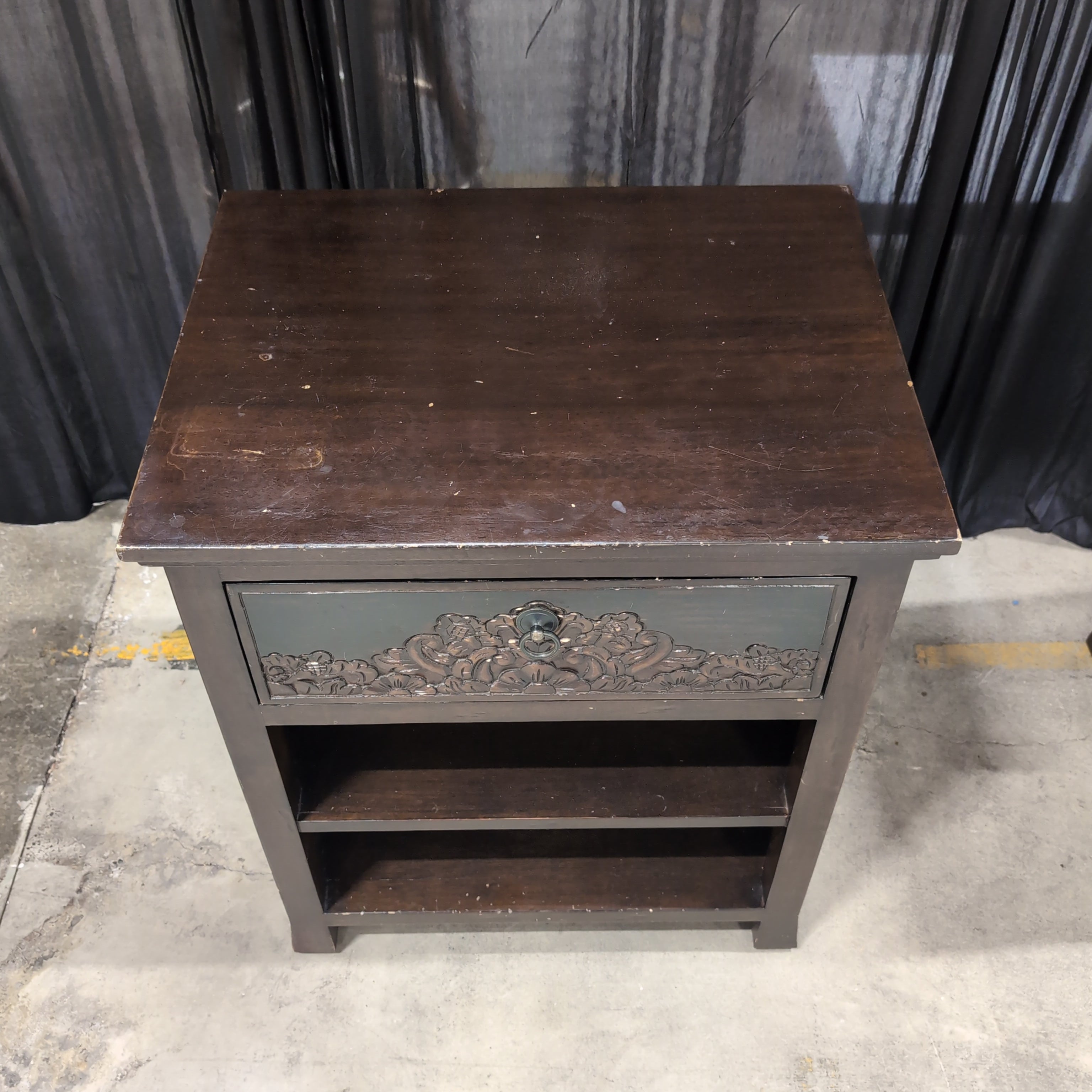 Dark Wood Nightstand with Carved Drawer Front