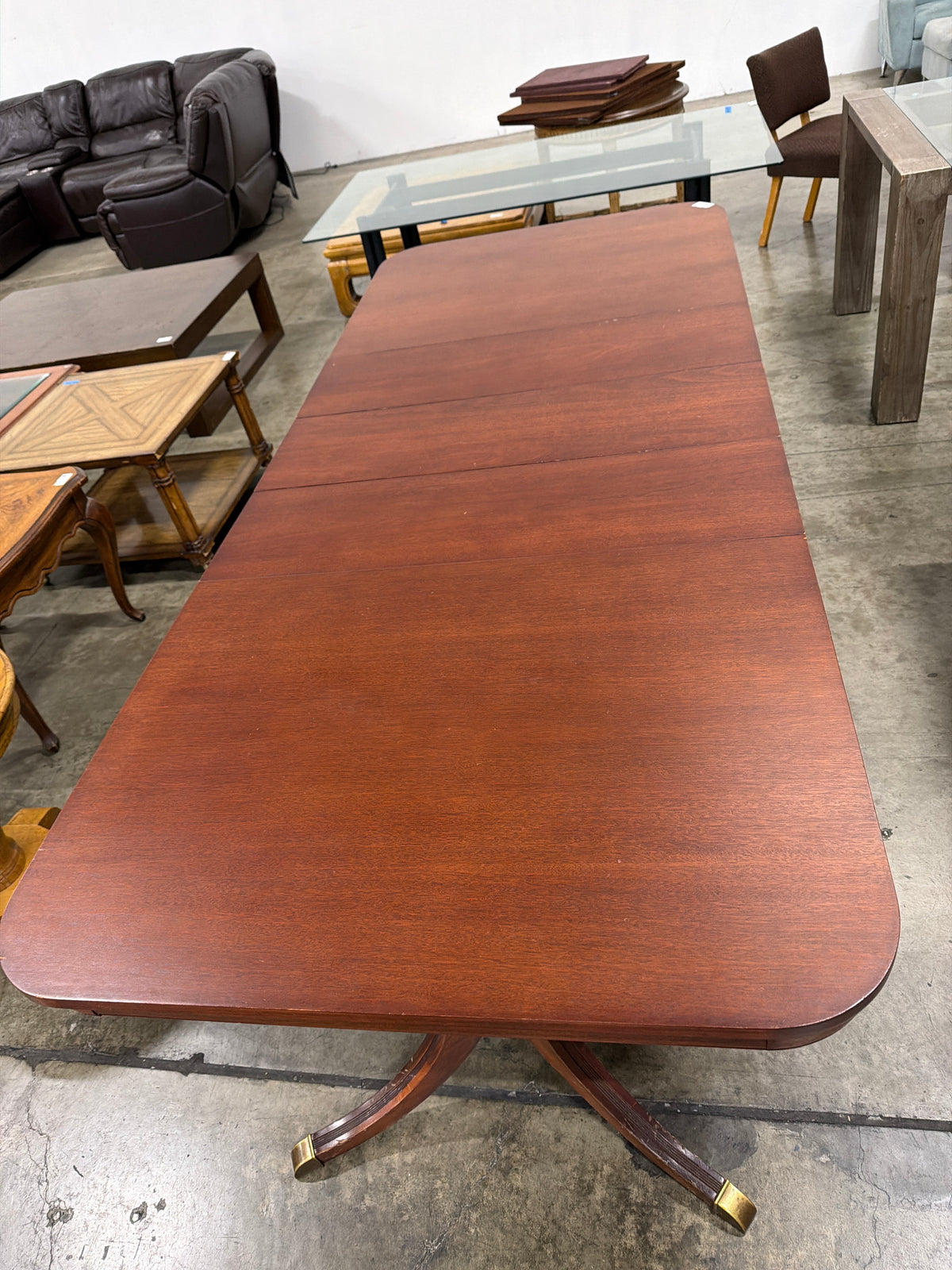 Reddish Brown Hardwood Dining Table with Rounded Corners
