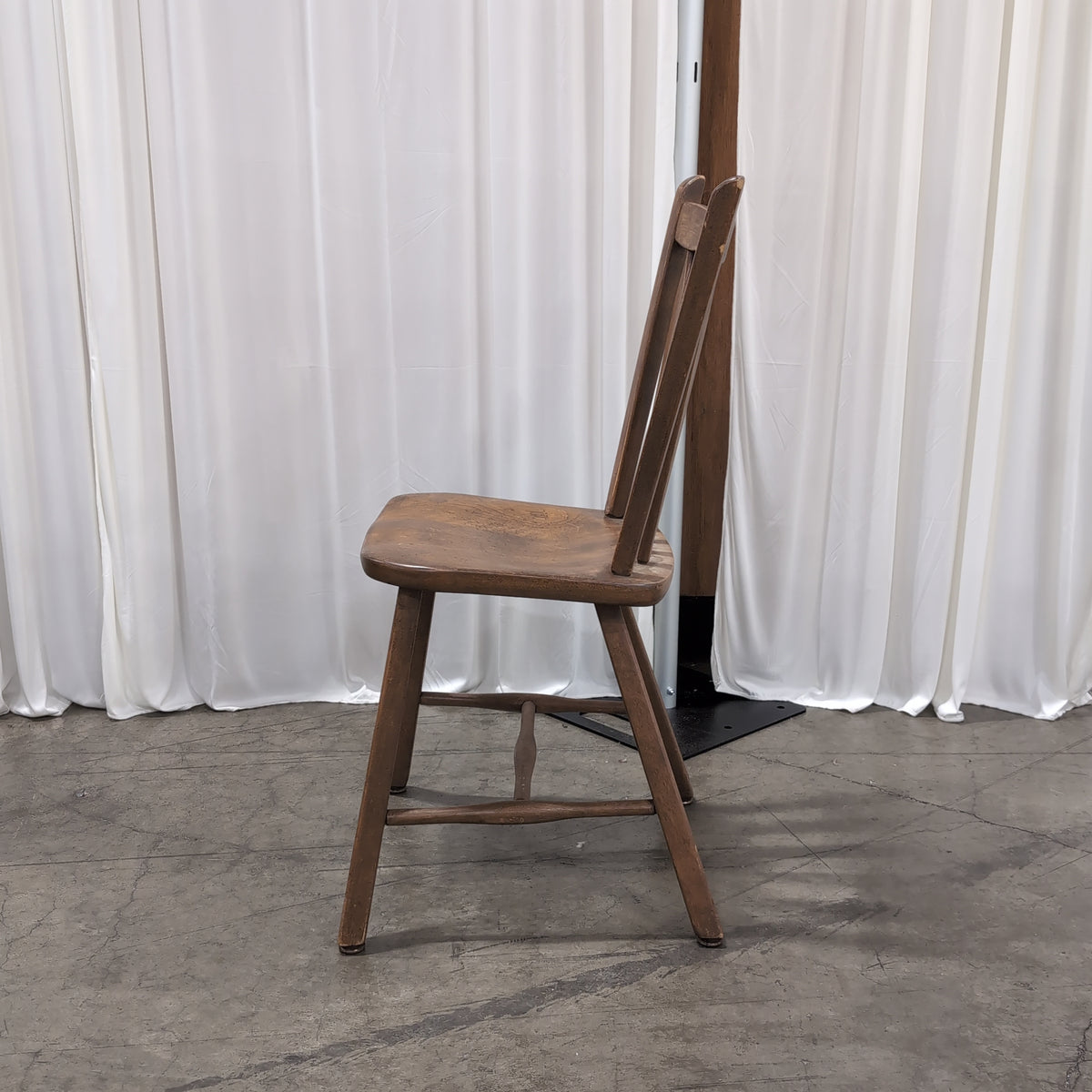 Cushman Colonial Brown Stained Wood Spindle Back Chair