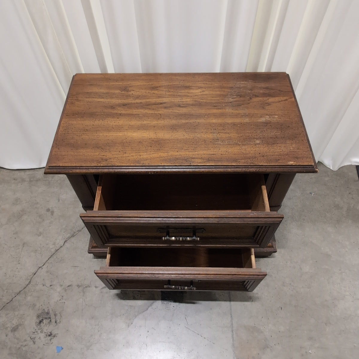 Traditional Dark Wood Dresser with Ornate Hardware
