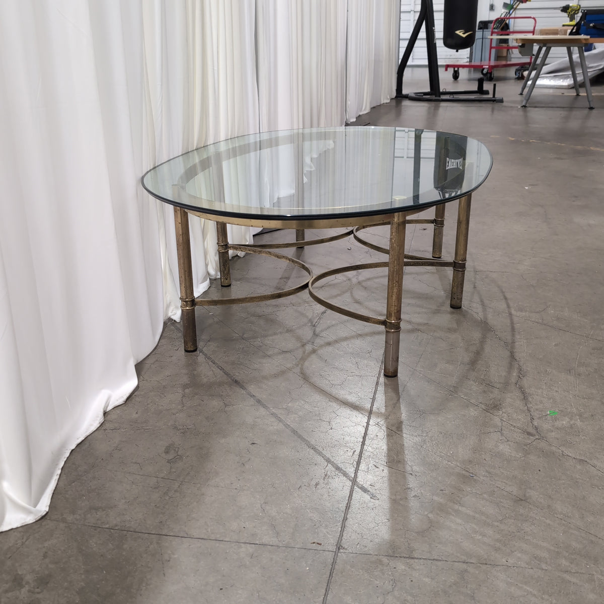 Oval Glass Top Coffee Table in Brass-Tone Metal