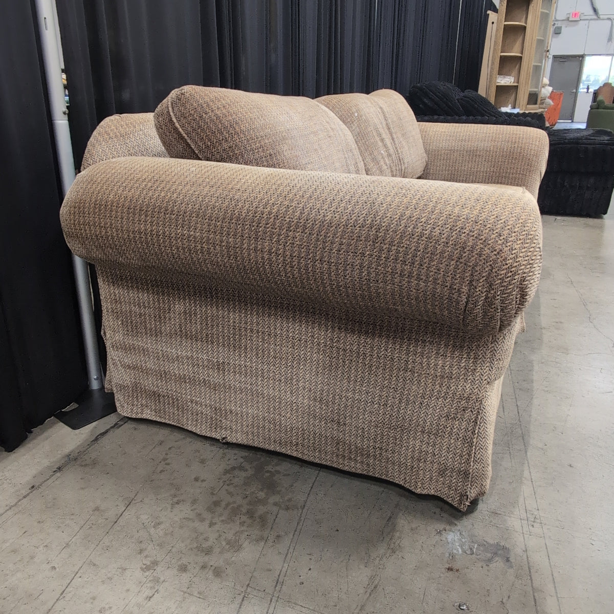 Tan Herringbone Upholstered Rolled Arm Couch with Skirted Base