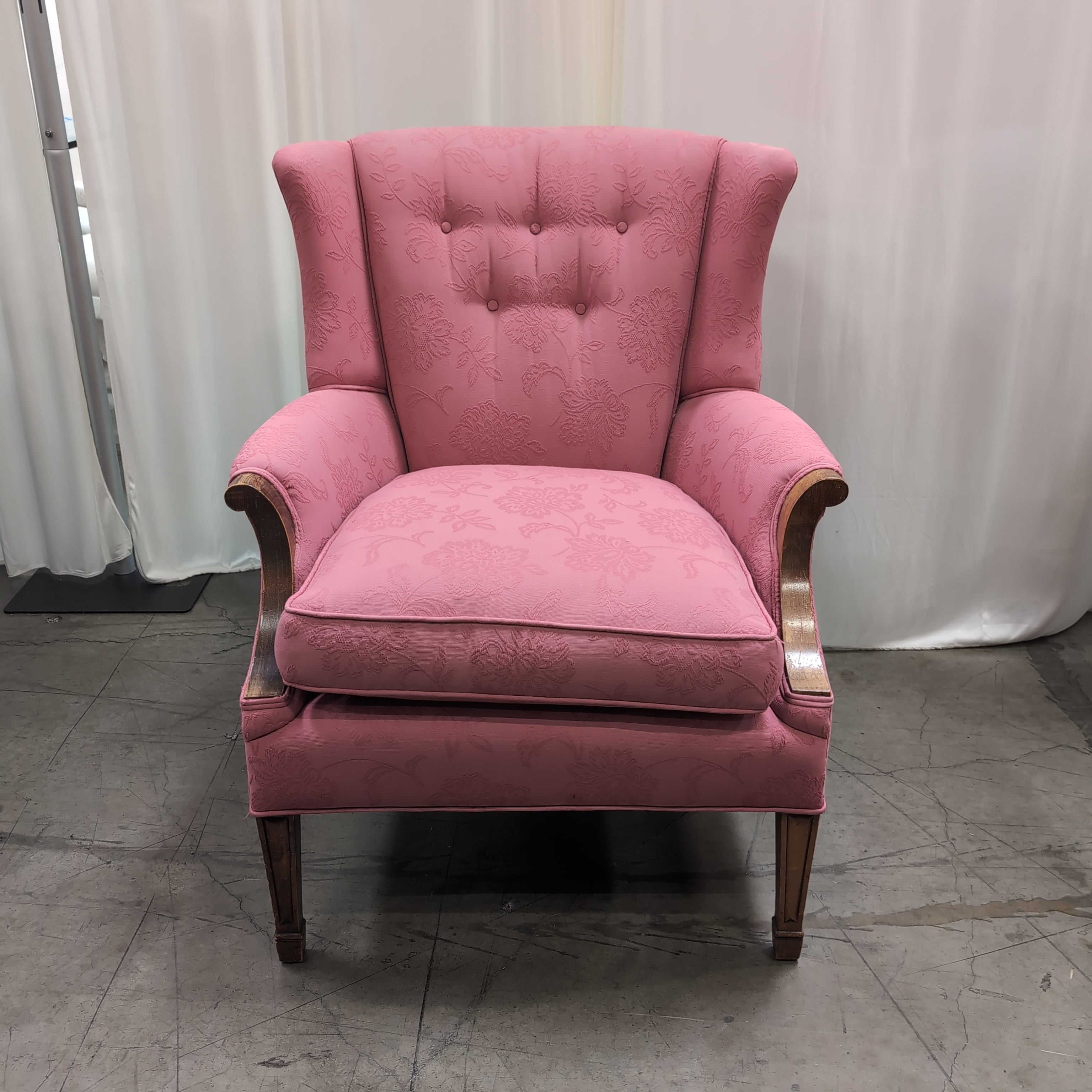 Pink Floral Upholstered Wingback Chair with Carved Wood Arms