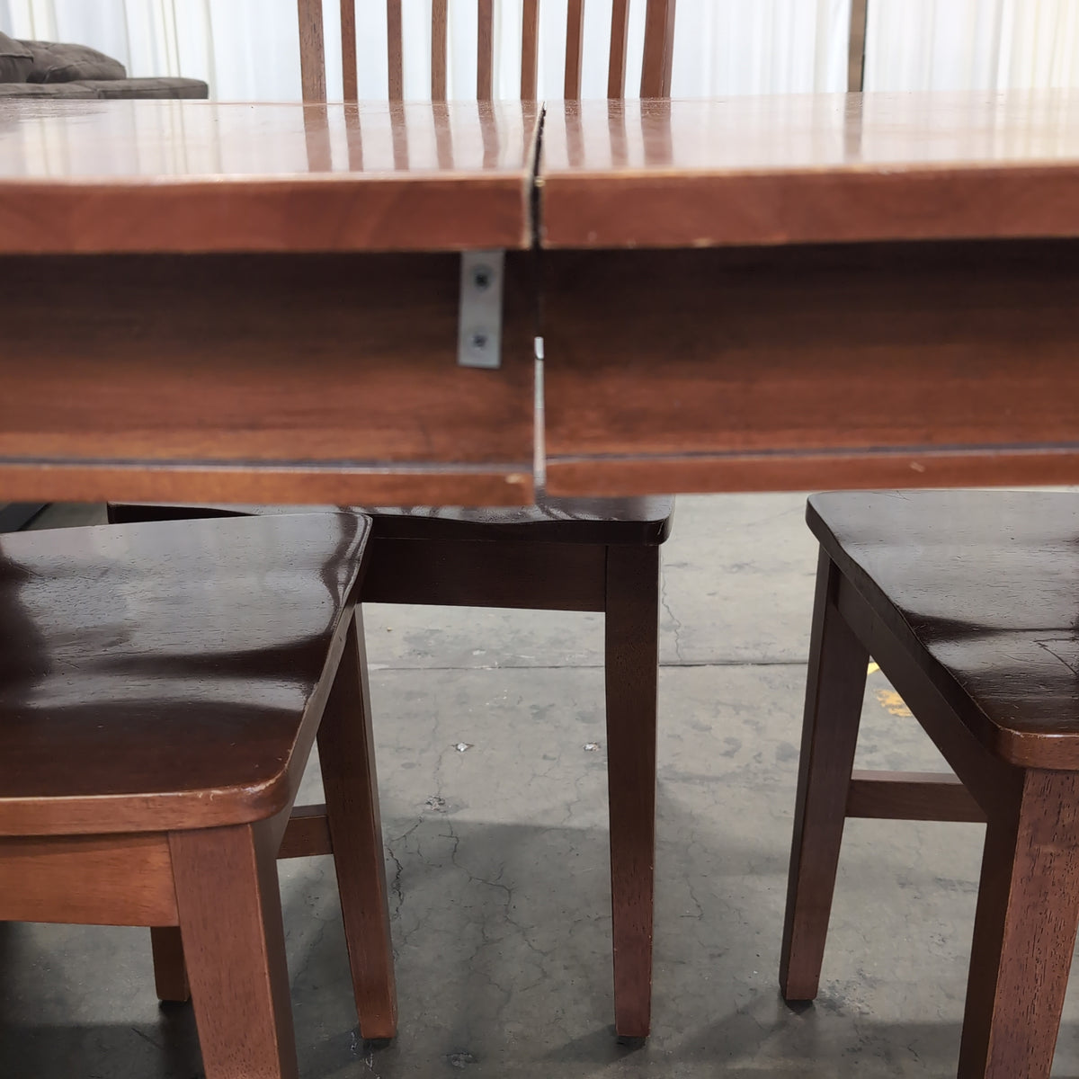Brown Wood Dining Table and Four Chairs with Slatted Back Chairs