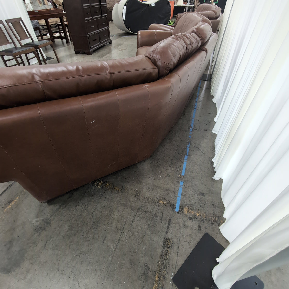 Brown Leather Curved Sectional Couch