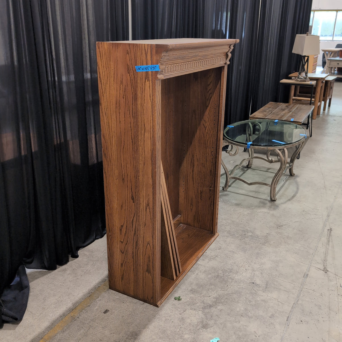Brown Wood Grain Bookcase with Decorative Crown Molding
