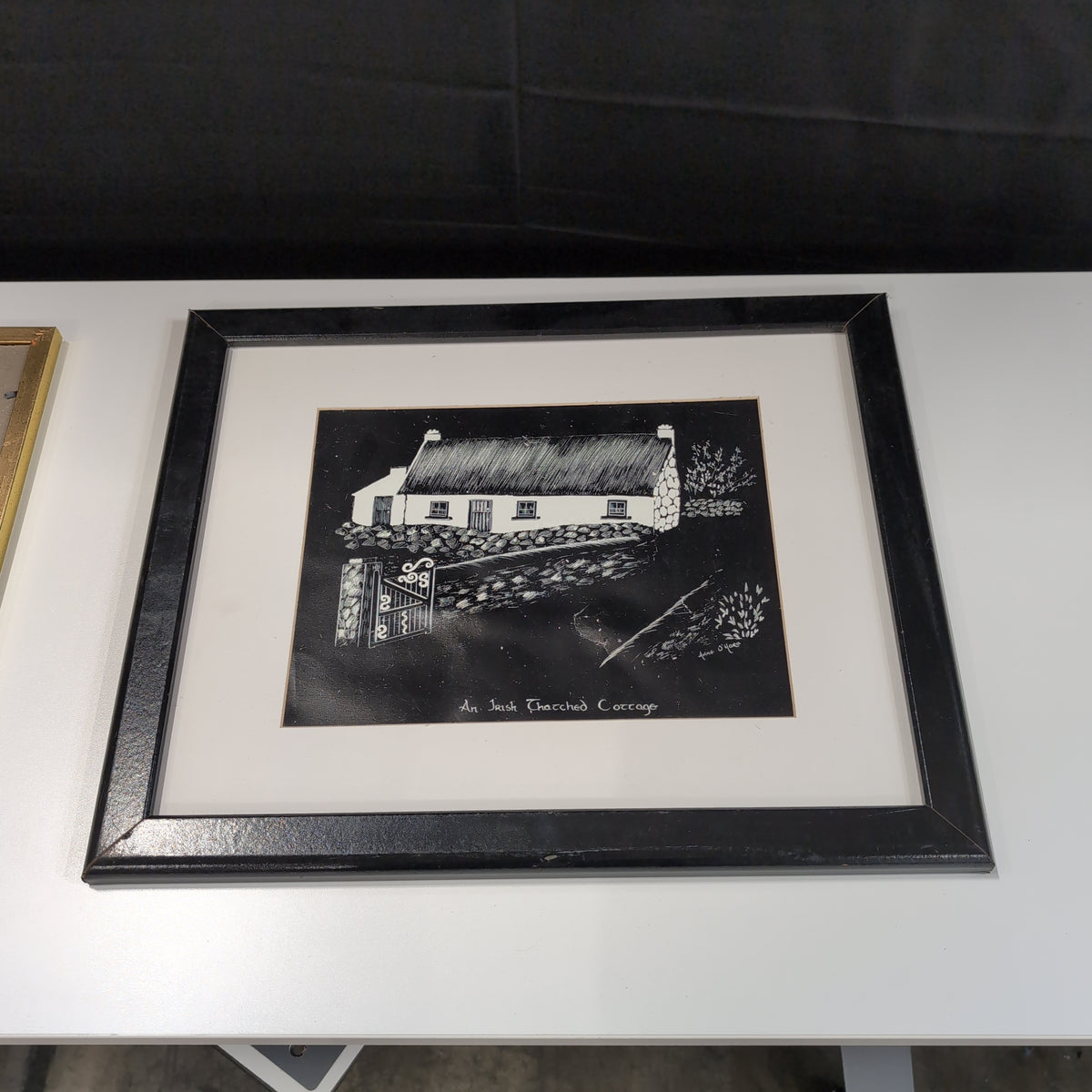 Monochrome Irish Thatched Cottage Art Print in Black Frame
