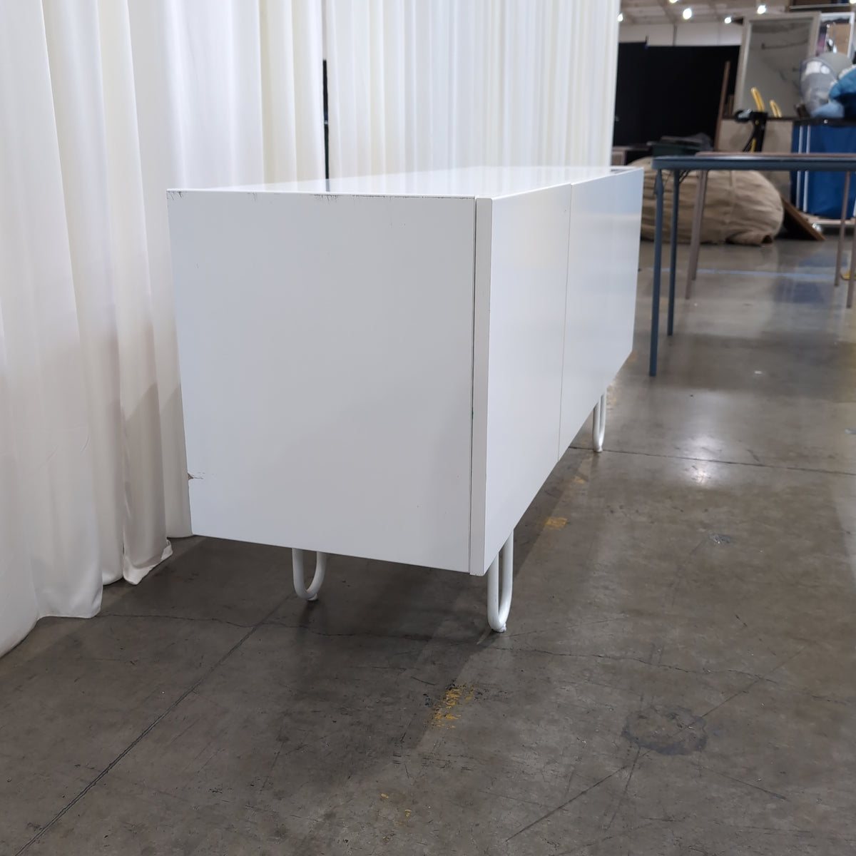 Minimalist White Three-Door TV Stand with Hairpin Legs