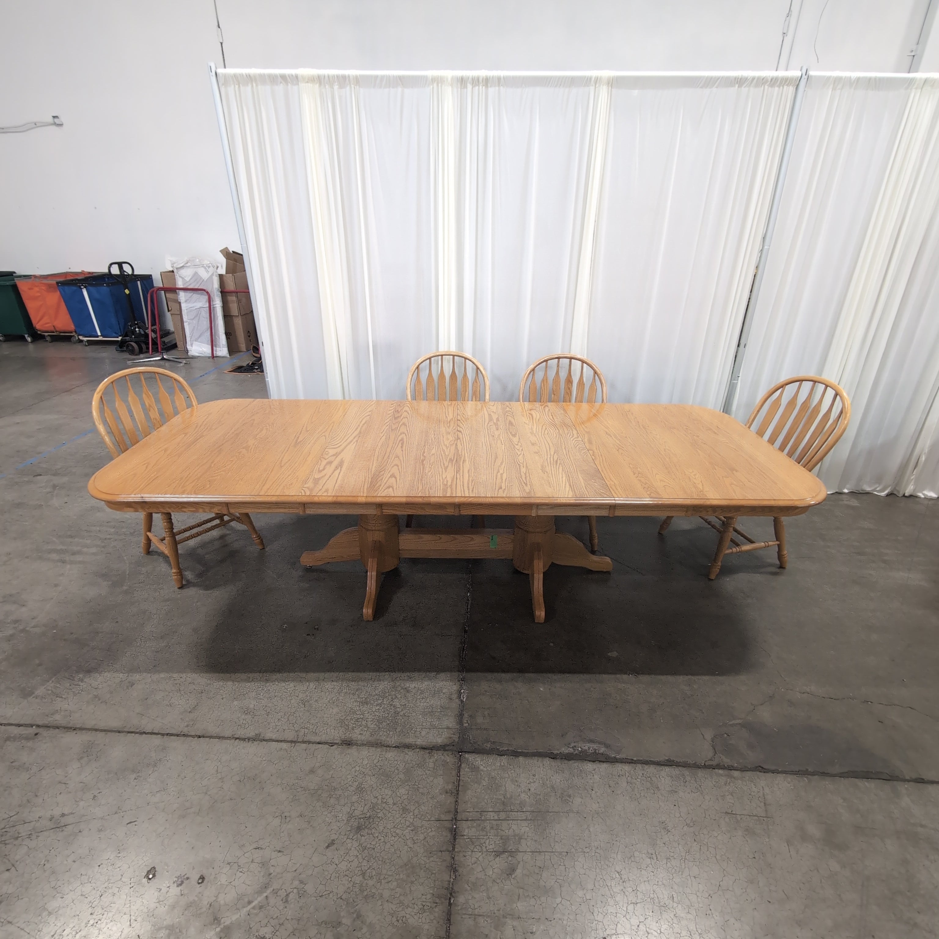 Light Wood Pedestal Dining Table with Four Windsor Chairs
