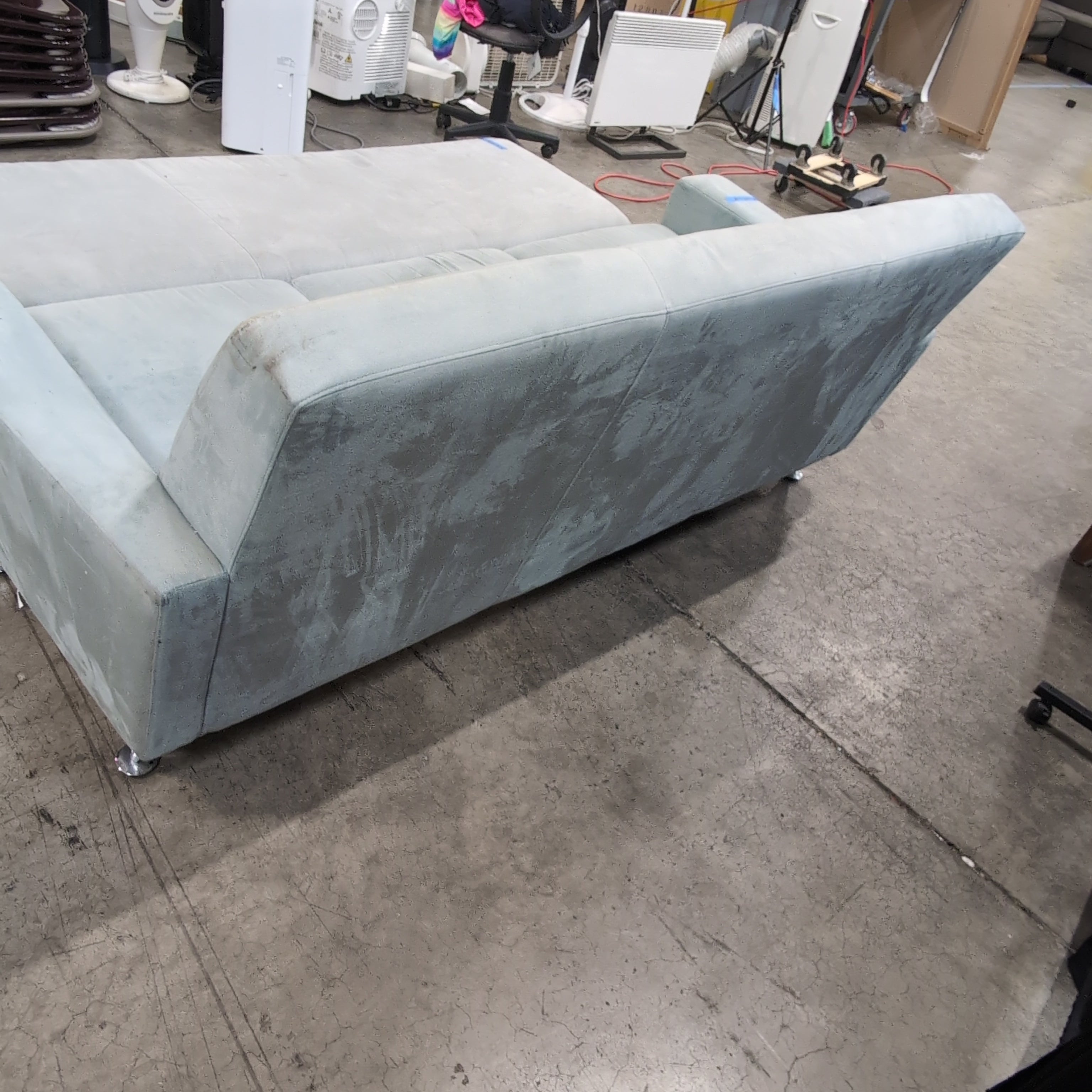 Light Grey Upholstered Couch with Tufted Back