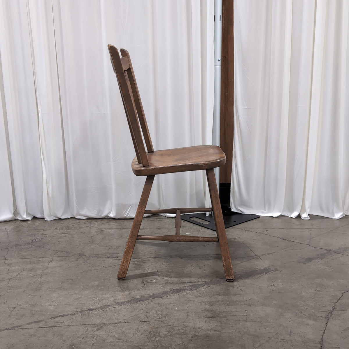 Cushman Colonial Brown Stained Wood Spindle Back Chair
