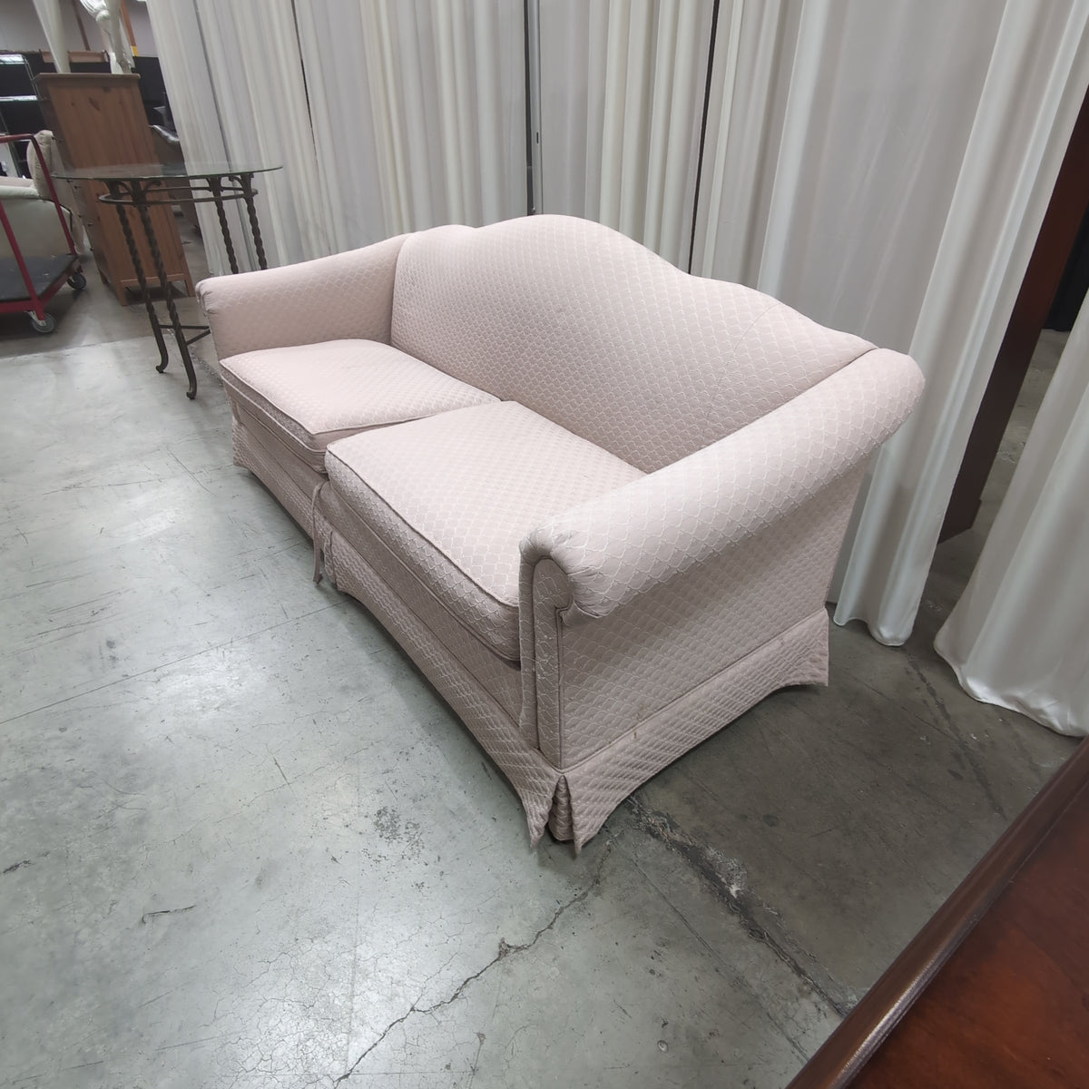 Blush Rolled Arm Couch with Skirted Base