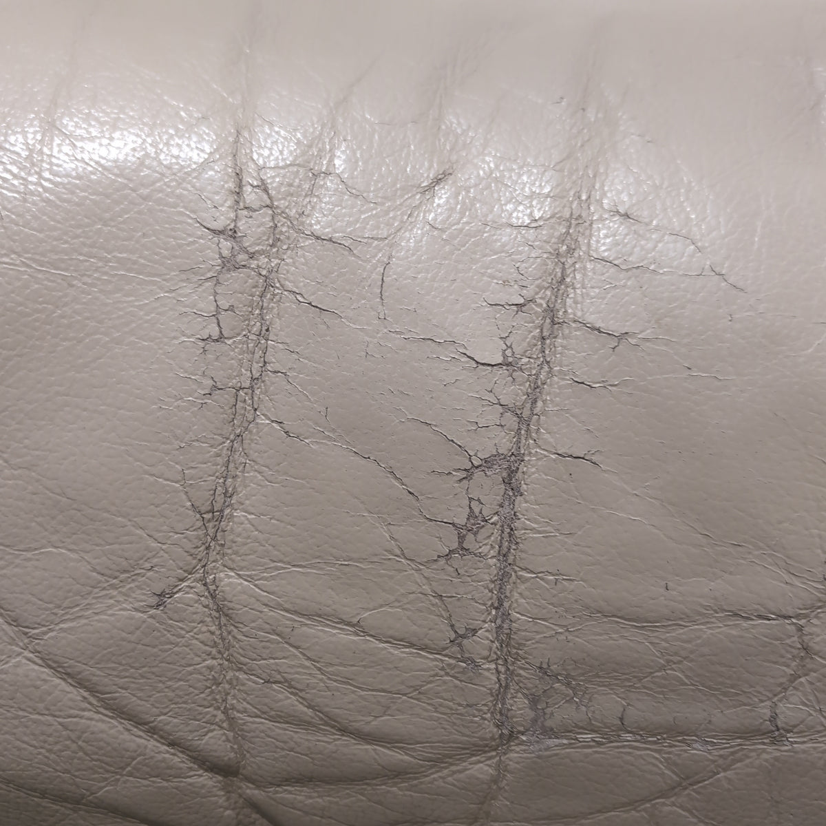 Overstuffed Light Beige Recliner in Leather