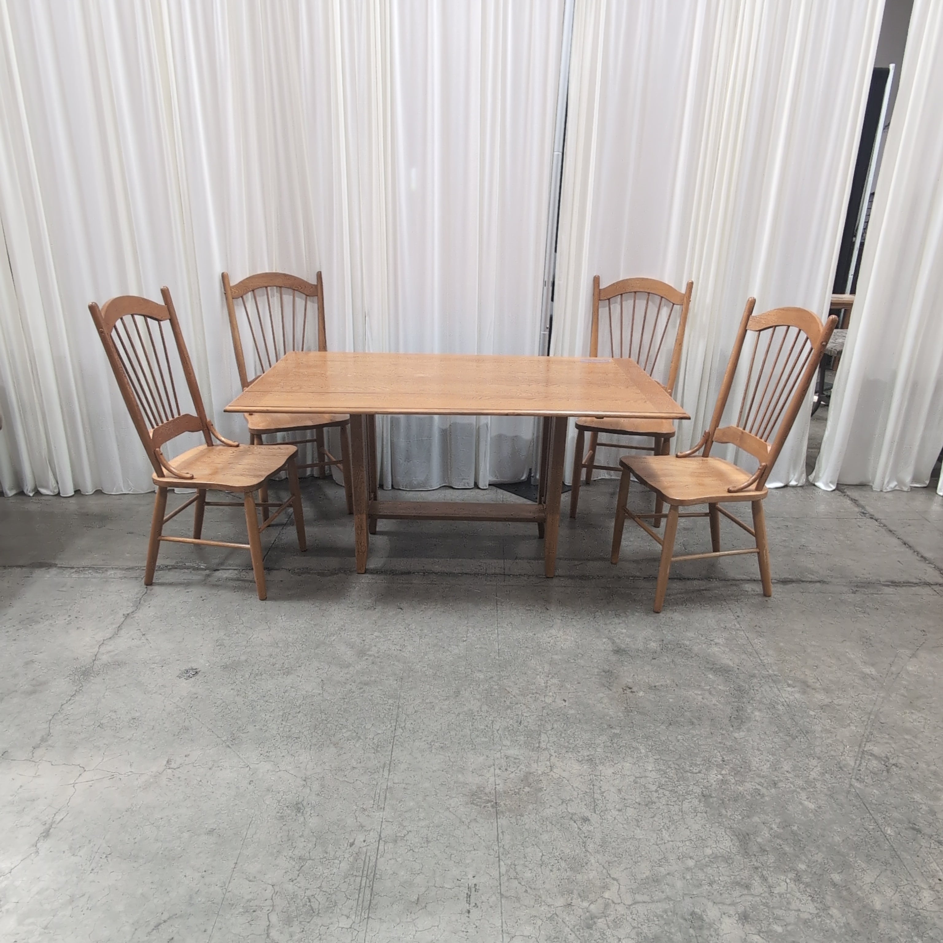 Oak Tone Drop Leaf Dining Table with Spindle Back Chairs