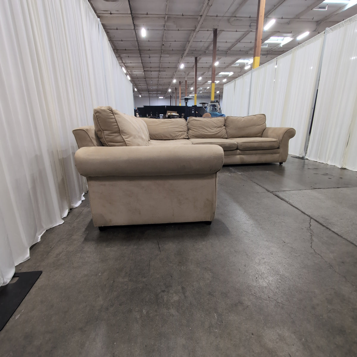 Tan L-Shaped Sectional Couch with Rolled Arms