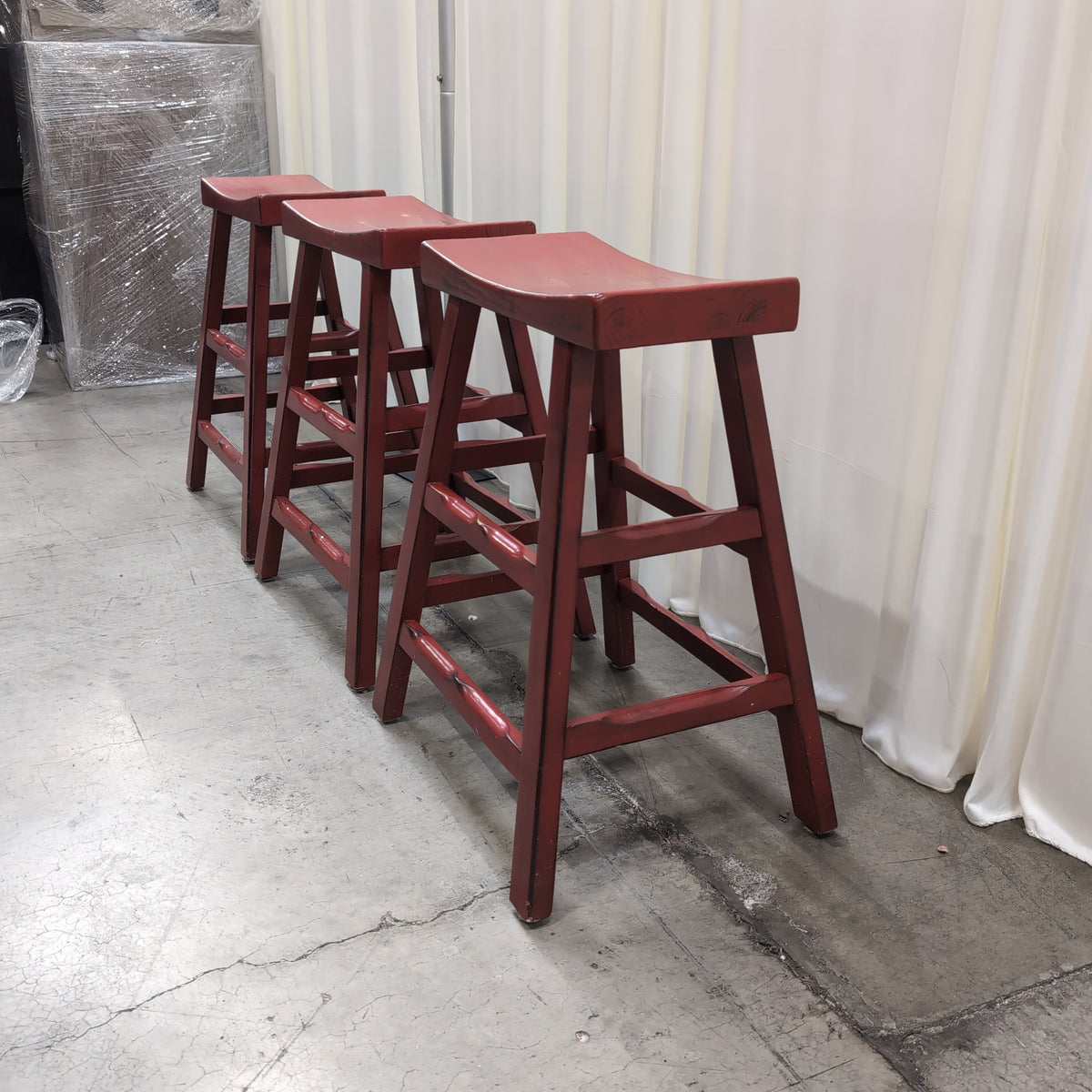 Red Wood Saddle Seat Bar Stool