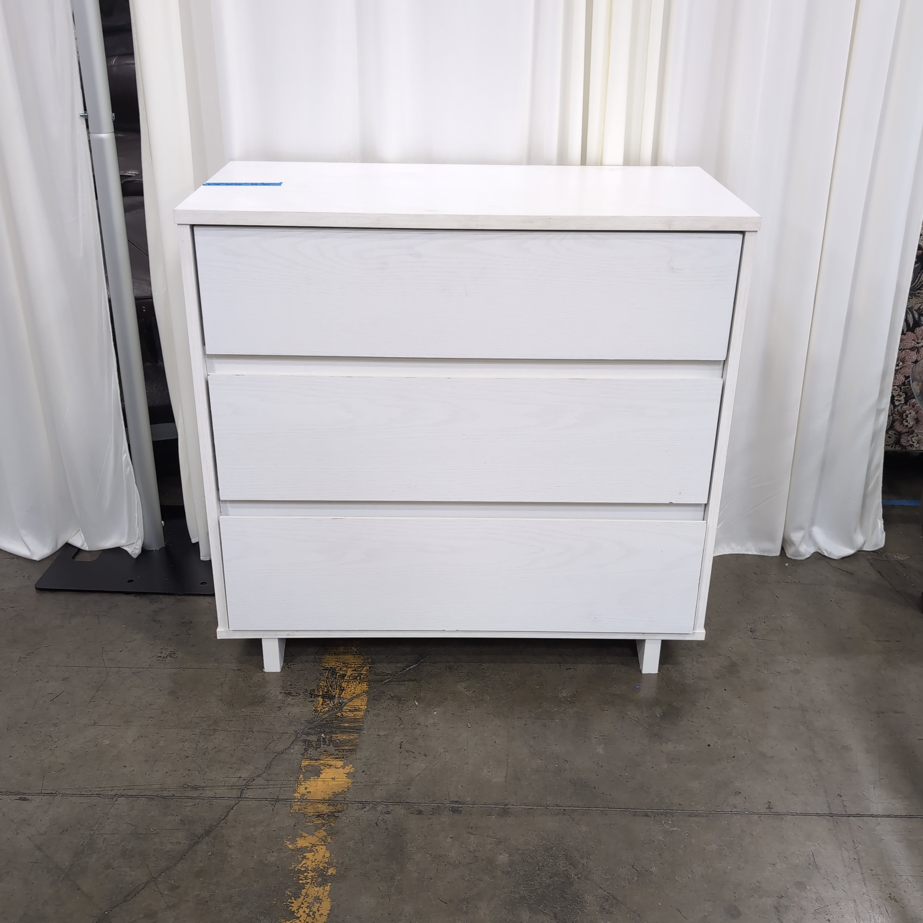 White Three-Drawer Dresser in Wood Finish