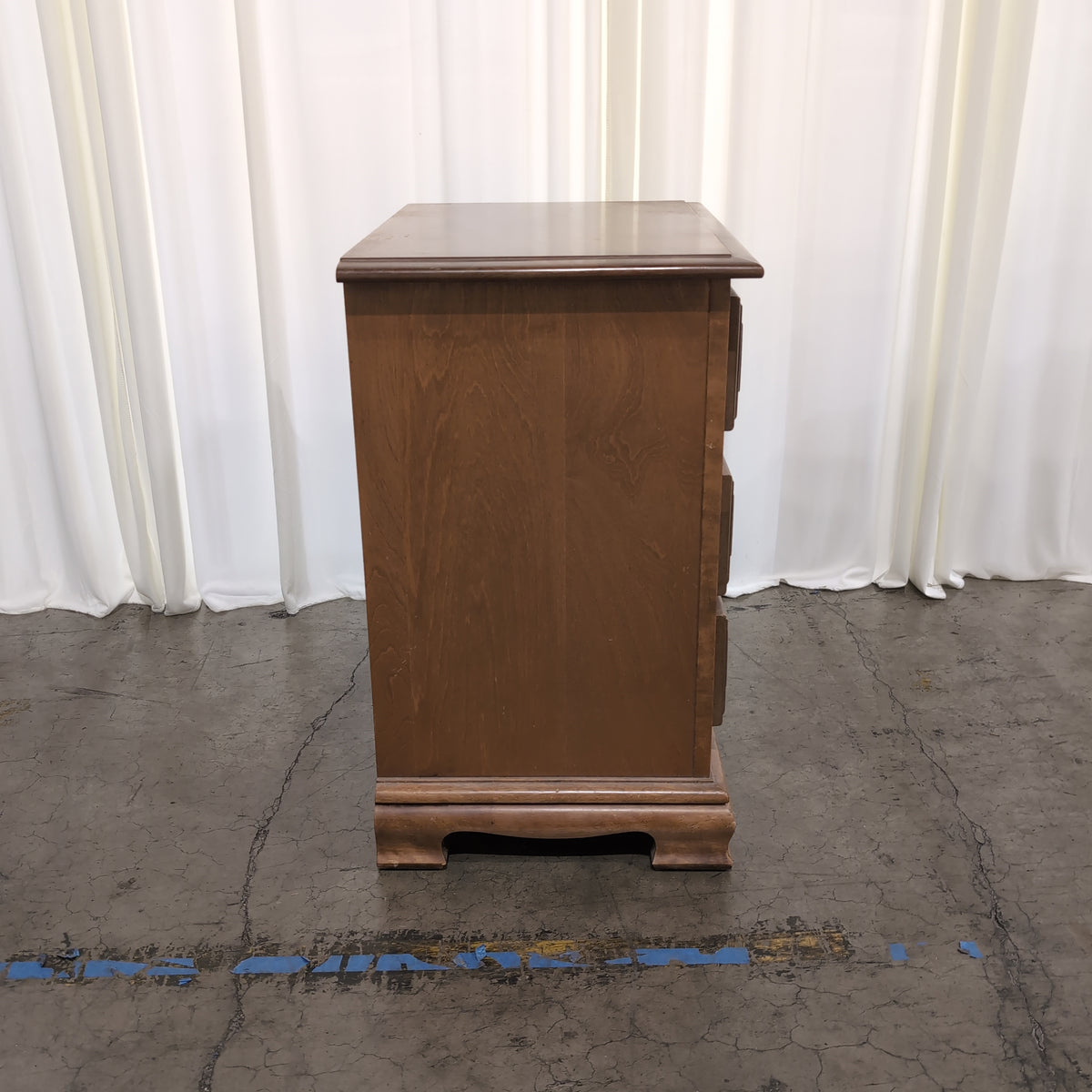 Traditional Brown Wood Nightstand with Three Drawers