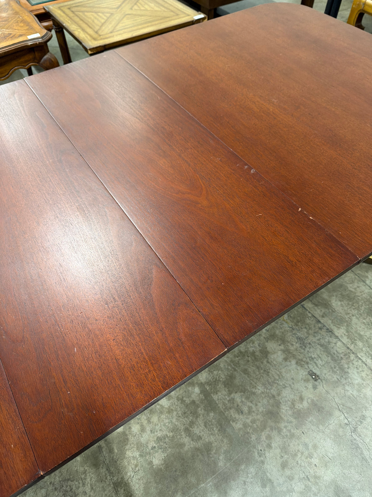 Reddish Brown Hardwood Dining Table with Rounded Corners
