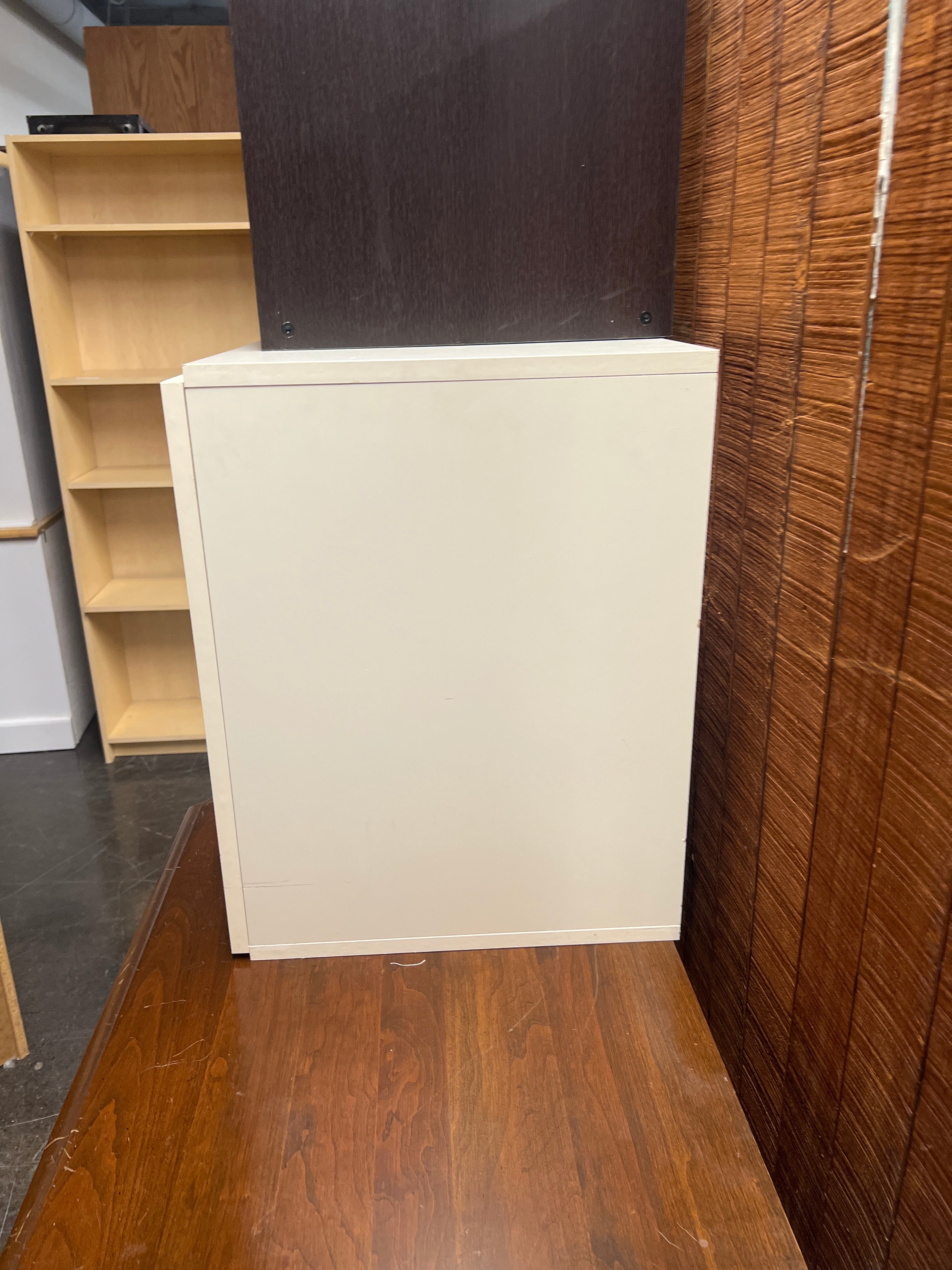 White cabinet with metal pulls