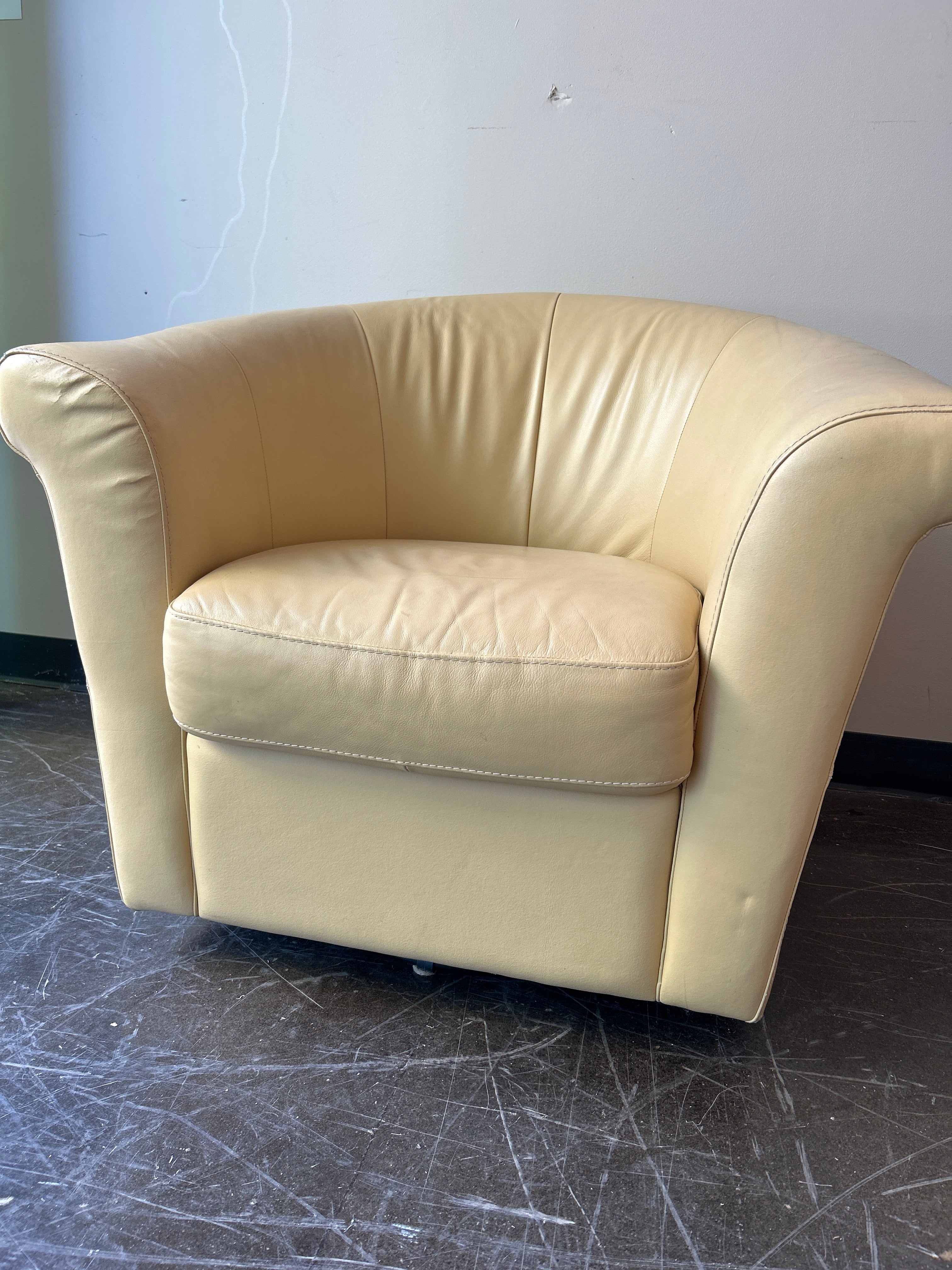Butter Yellow Colored Leather Swivel Chair