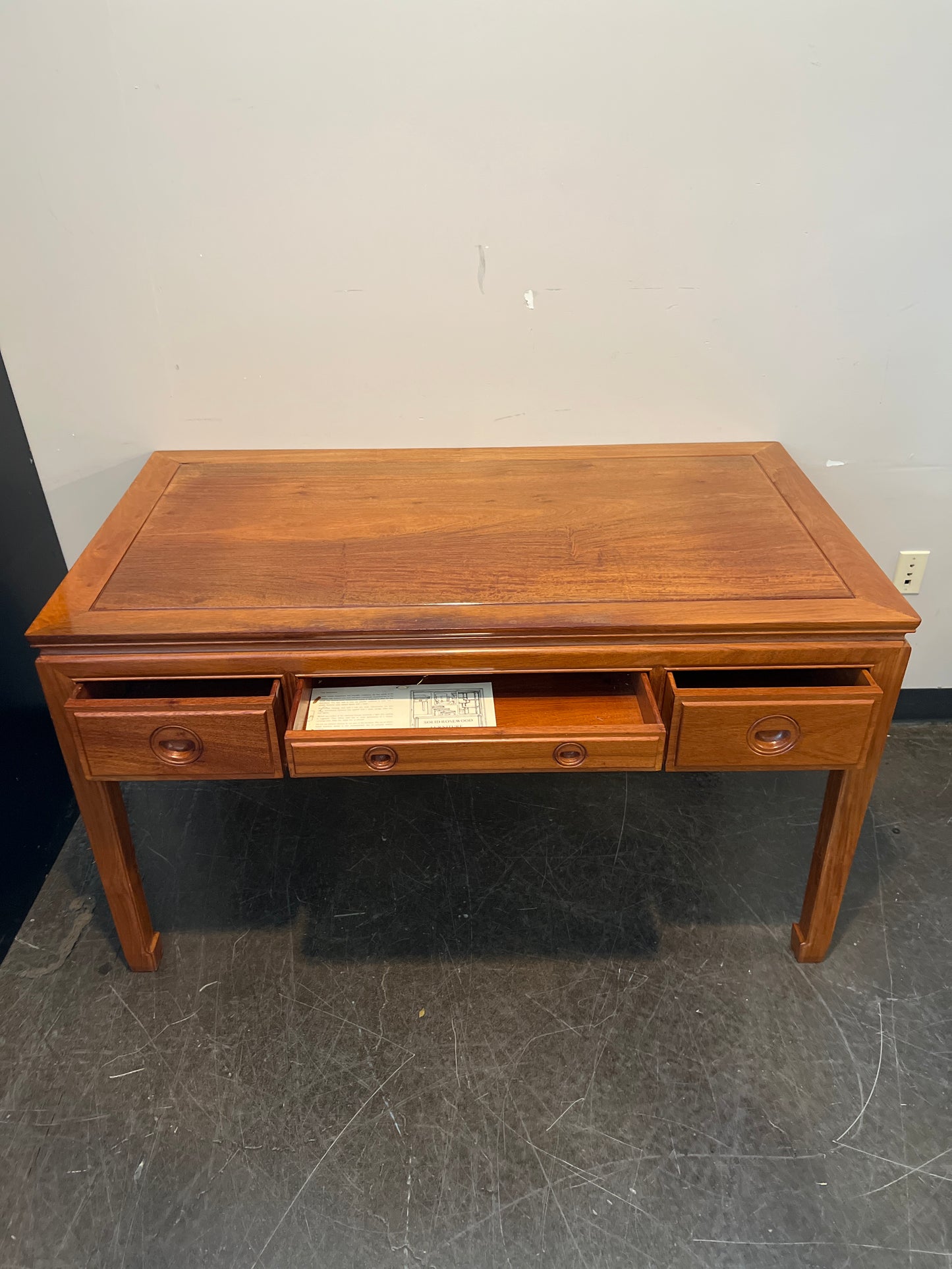 Richly-Toned Wood Writing Desk with Three Drawers