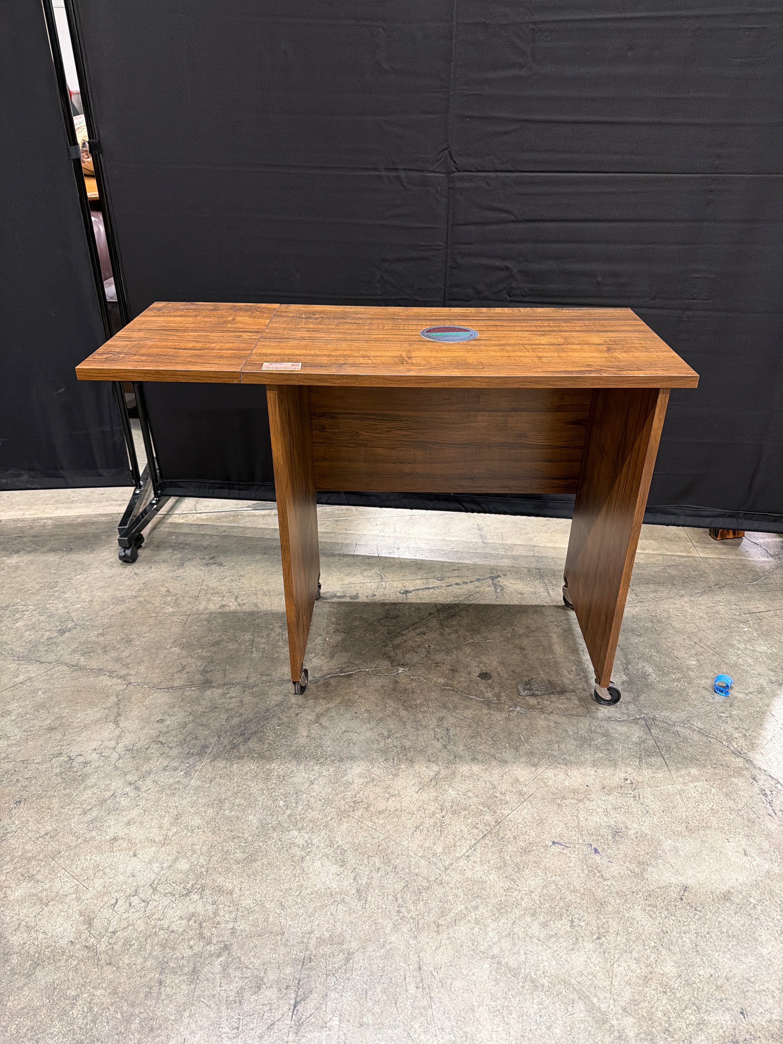 O’Sullivan Rectangular Wood Utility Table with Folding Leaf and Rolling Casters